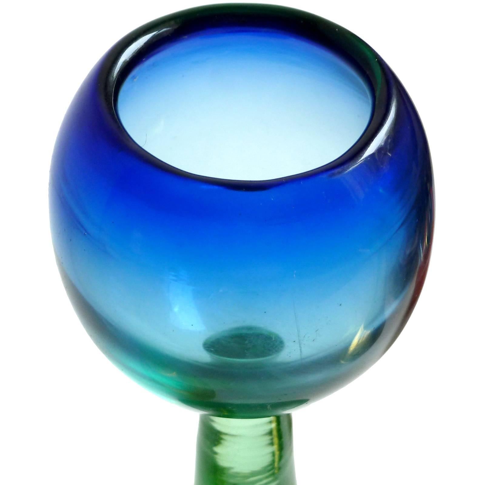 FREE Shipping Worldwide! See details below description.

Amazing Murano Handblown Sommerso Rainbow Colors Art Glass Candlesticks. Documented to the Salviati company, circa 1950-1960. The first piece with orange top is very unusual, made in