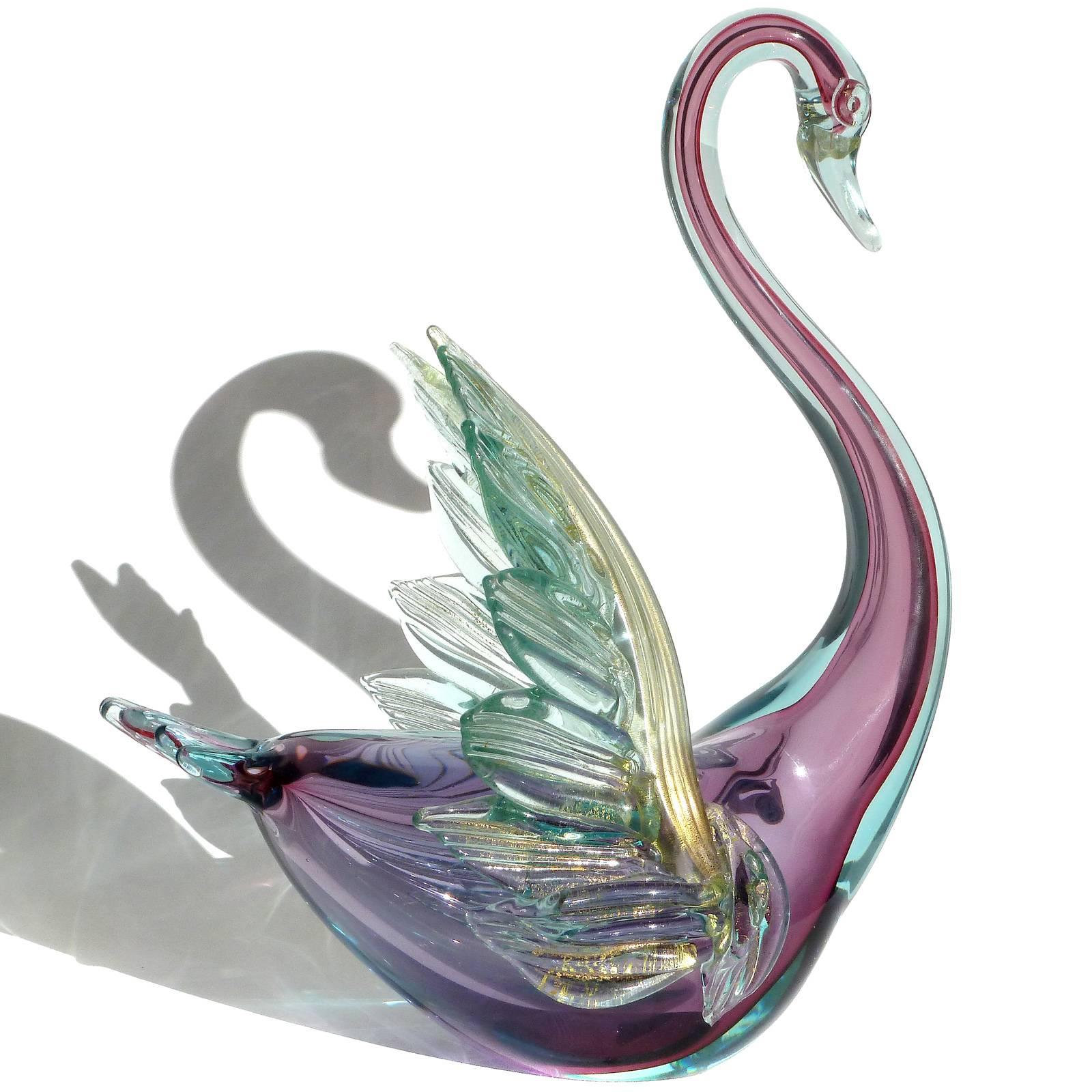 Free shipping worldwide! See details below description.

Large Murano handblown Sommerso purple, blue and gold flecks art glass swan centerpiece sculpture. Documented to designer Alfredo Barbini, circa 1950s-1960s, and published in his catalog.