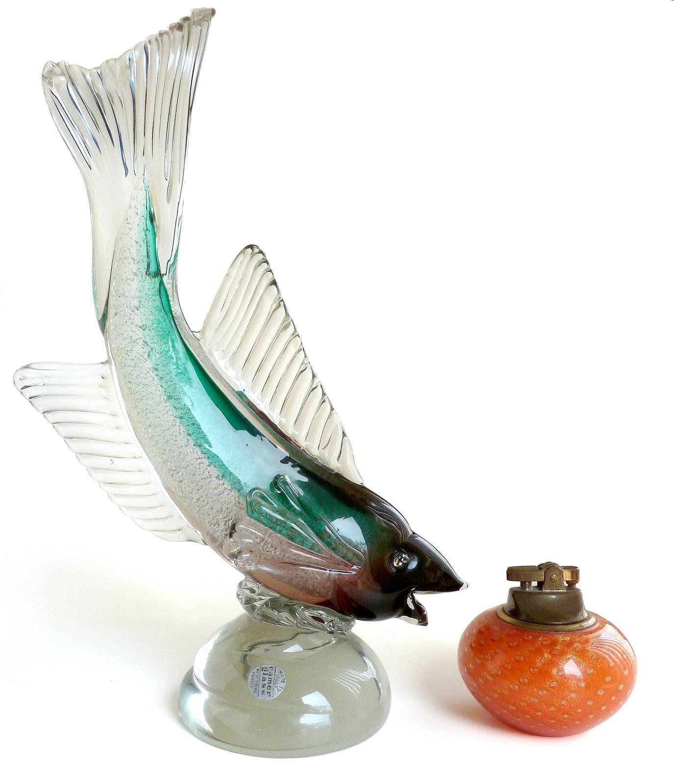 Free shipping worldwide! See details below description.

Large Murano hand blown silver flecks fish in Sommerso purple and green art glass sculpture. Documented to designer Archimede Seguso. The fish is well detailed with a natural appearance. It