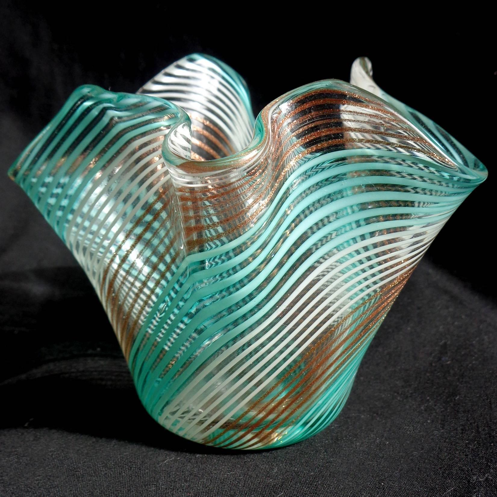 Free shipping worldwide! See details below description.

Beautiful set of three Murano handblown filigrana ribbons art glass small vases. Documented to designer Dino Martens for Aureliano Toso. Measurements vary, largest is 4 1/4