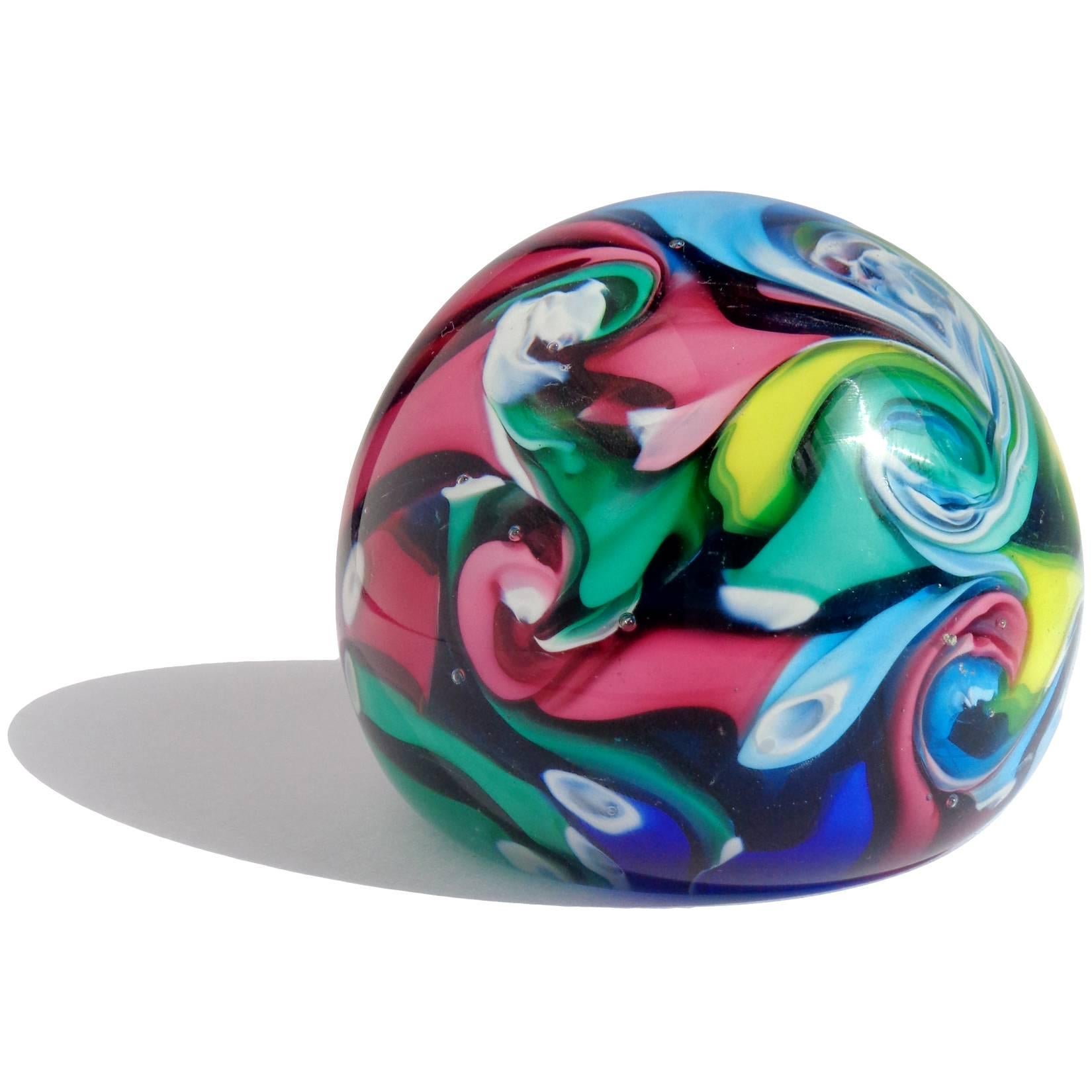 Free shipping worldwide! See details below description.

Beautiful and colorful set of Murano handblown rainbow ribbons, swirling and scrambled Millefori paperweights. Documented to the Fratelli Toso company. The striped and Millefori paperweights