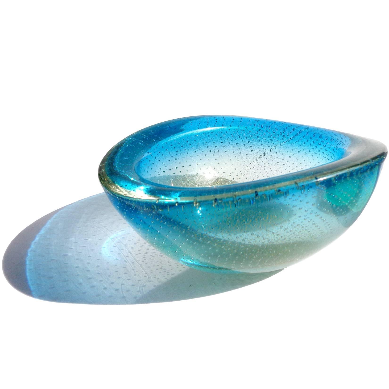 Free shipping worldwide! See details below description.

Early Murano handblown blue Sommerso, controlled bubbles and gold flecks art glass bowl. Documented to designer Flavio Poli and Archimede Seguso for Seguso Vetri d'Arte, circa 1937. The same