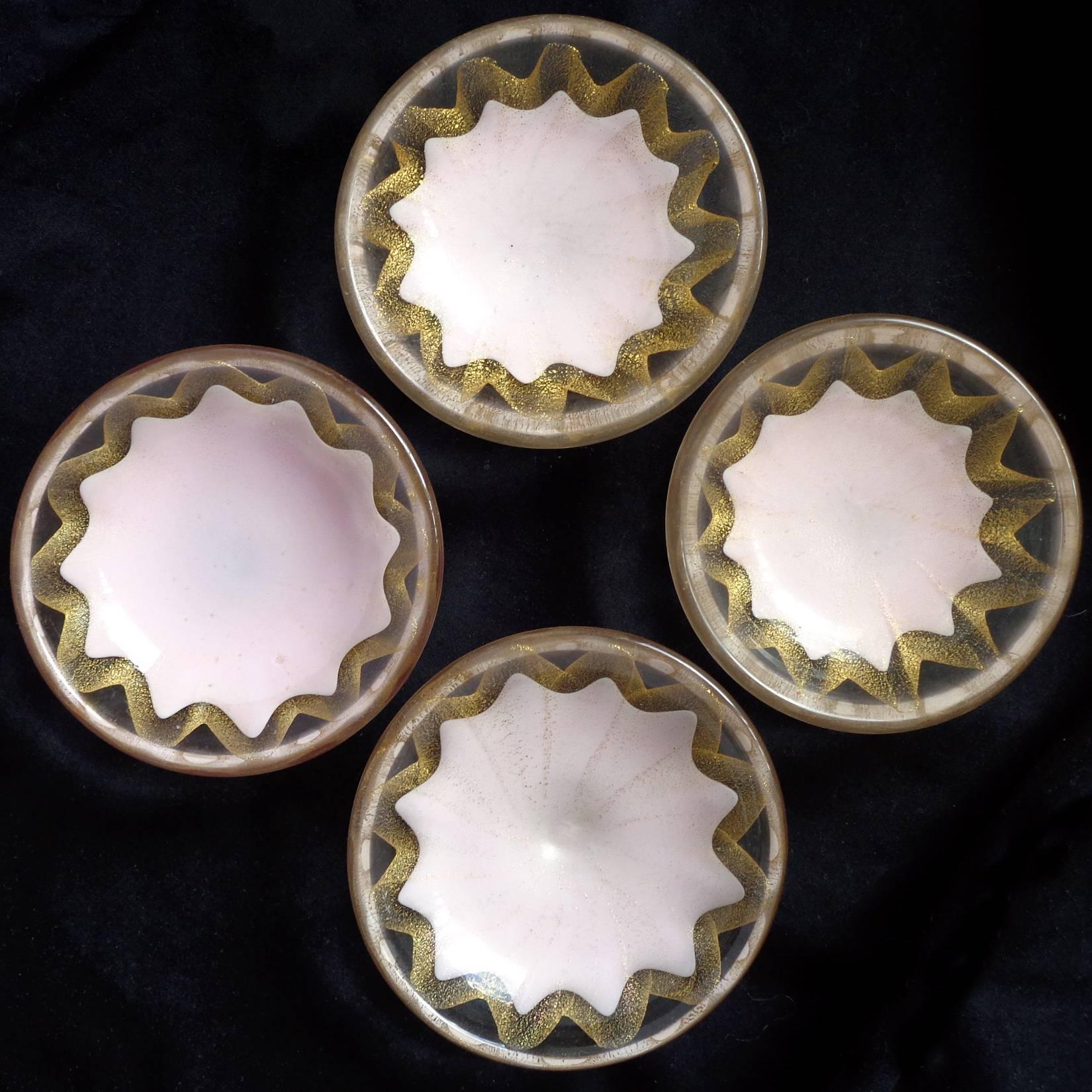 Free shipping worldwide! See details below description.

Beautiful set of four Murano handblown pink and gold flecks art glass star / sun design ring bowls or trinket dishes. Documented to the Salviati company, circa 1950s. Each is a little