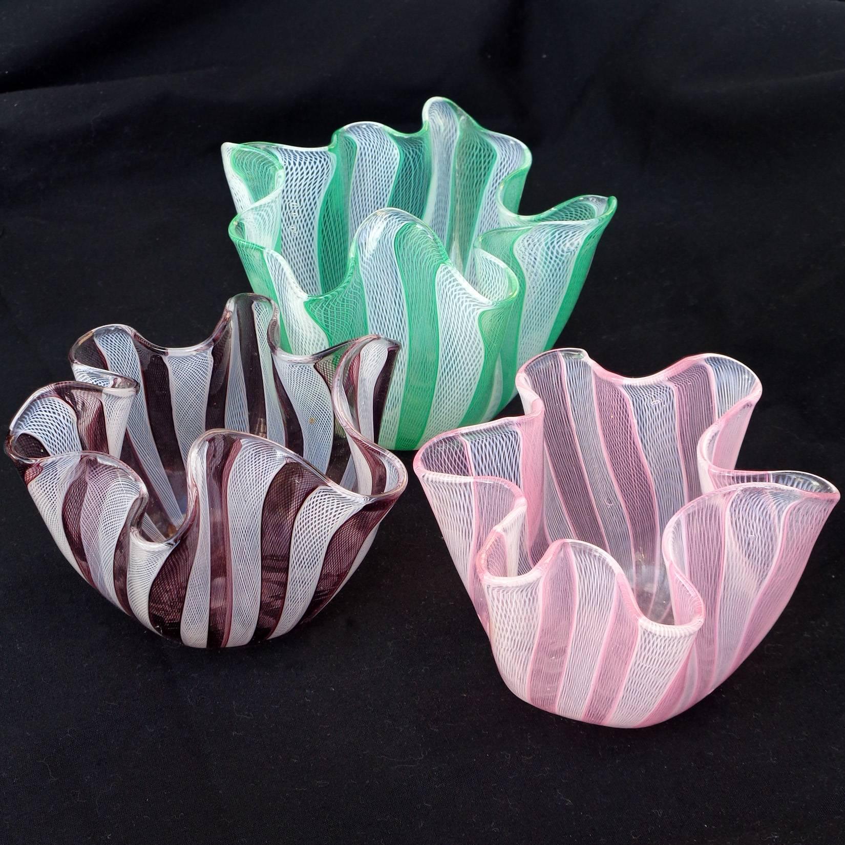 Free shipping worldwide! See details below description.

Beautiful set of Murano hand blown tight Zanfirico net ribbons art glass fazzoletto vases. Documented to Paolo Venini and Fulvio Bianconi. Pink and purple are signed 