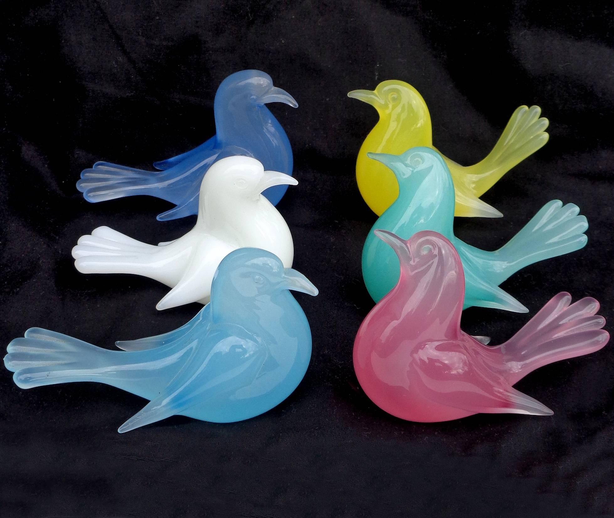 Free shipping worldwide! See details below description.

Amazing set of six Murano handblown opal white, powder blue, aqua blue, cobalt blue, yellow and pink art glass bird figurines. Documented to designer Archimede Seguso, some with labels still