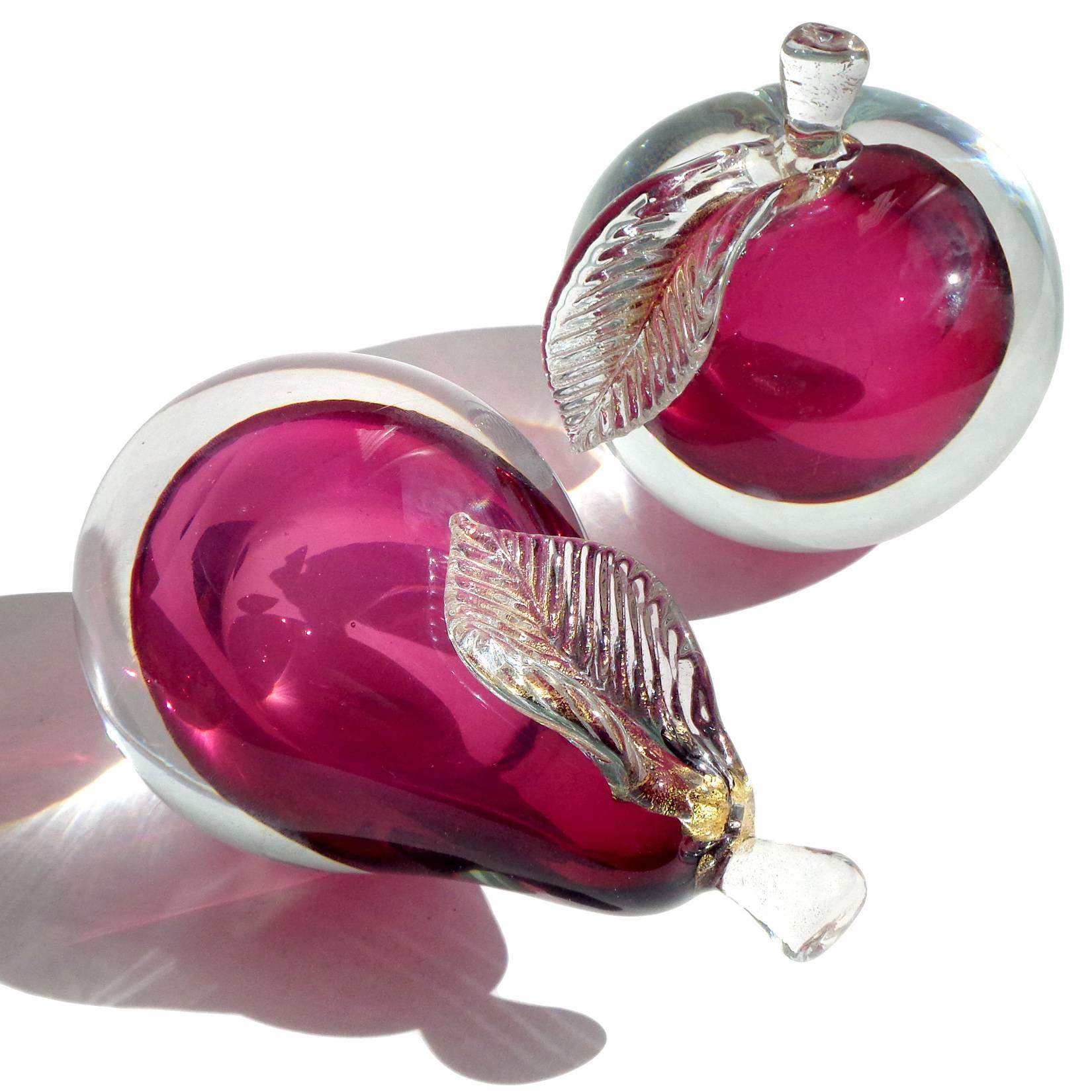 Free shipping worldwide! See details below description.

Beautiful Murano handblown, Sommerso cranberry red art glass pear and apple fruit bookends. Documented to designer Alfredo Barbini. The pieces have two polished ends, so they can be