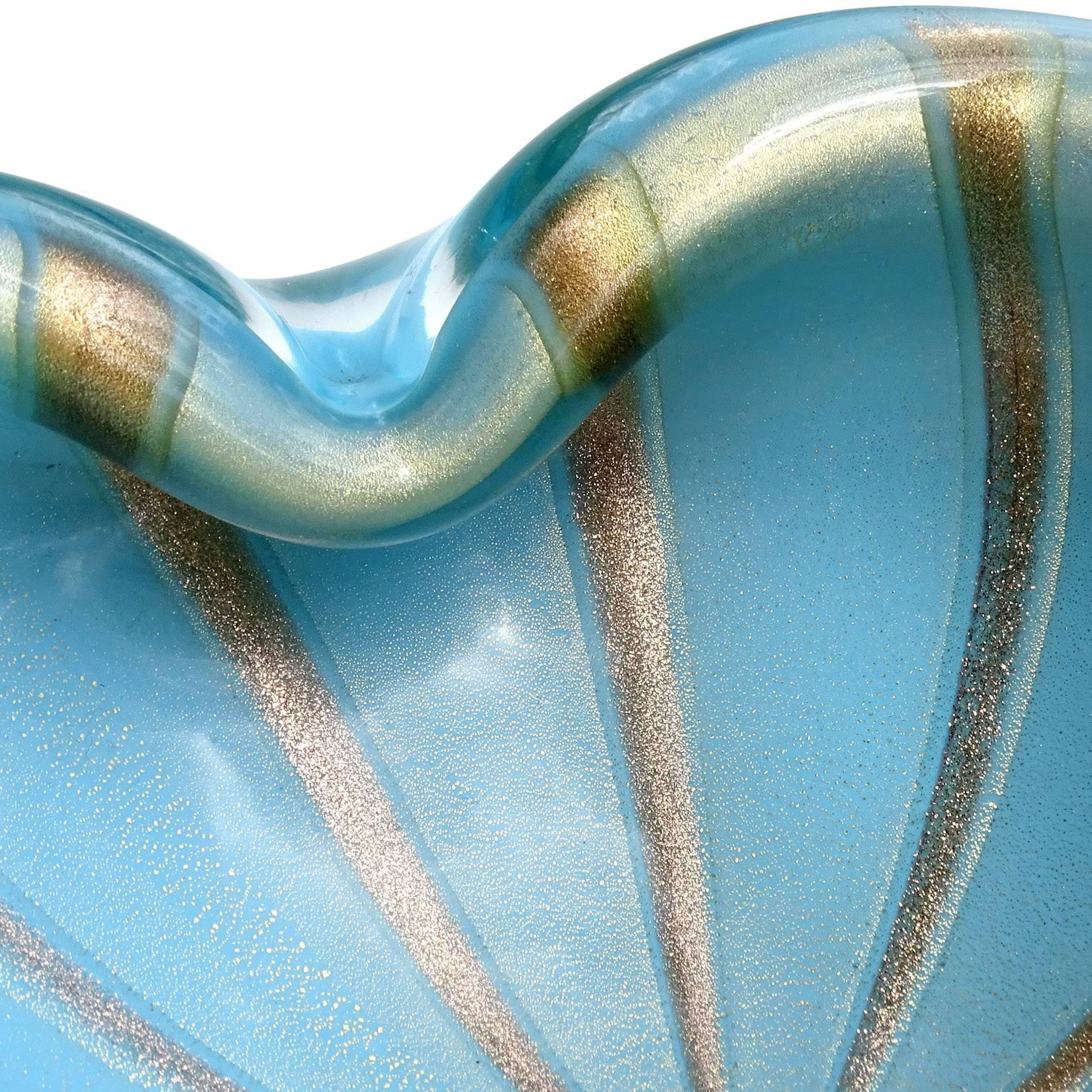 Free shipping worldwide! See details below description.

Gorgeous large Murano handblown blue, gold and aventurine flecks art glass bowl. Documented to designer Alfredo Barbini, circa 1950-1960. Measures 8 1/4
