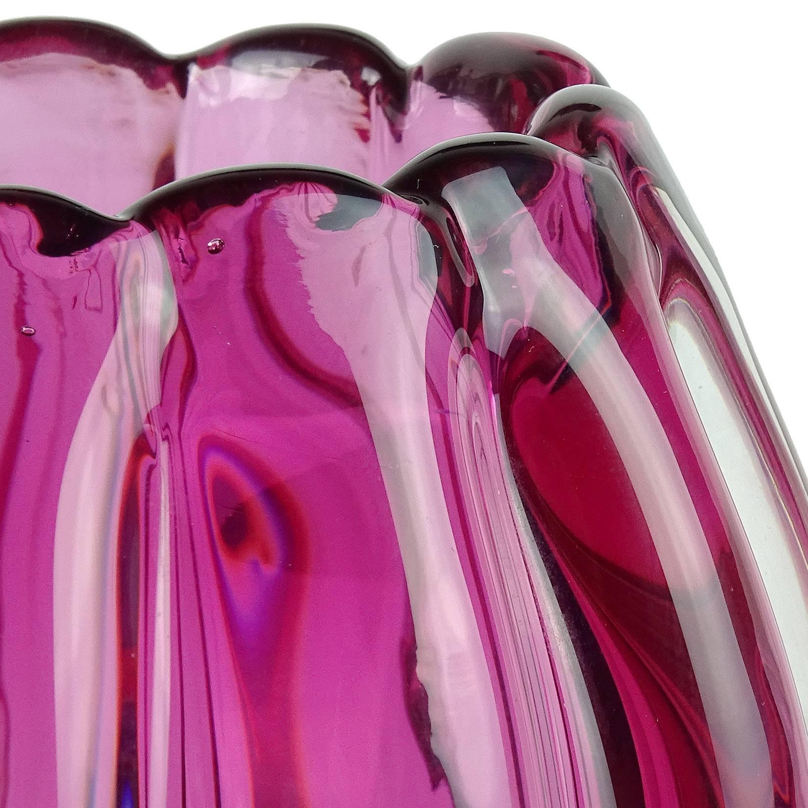 Beautiful Murano hand blown Sommerso deep pink, almost red, art glass ribbed flower vase. Documented to designer Alfredo Barbini. Very thick piece with beautiful shape. Measures 9 1/4" tall.
