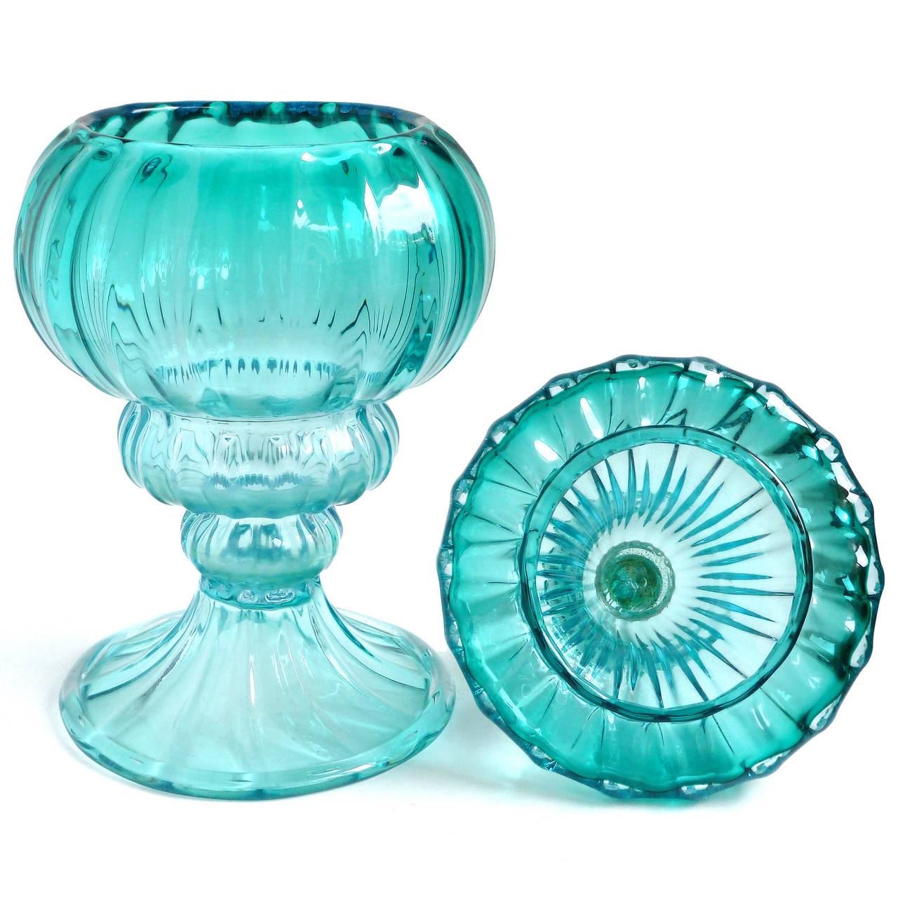 Beautiful large Murano hand blown blue green and gold flecks Italian art glass cookie or candy jar. Documented to designer Alfredo Barbini, circa 1950s, and published in his catalog. It has a ribbed design, with twisted curl at the top with gold