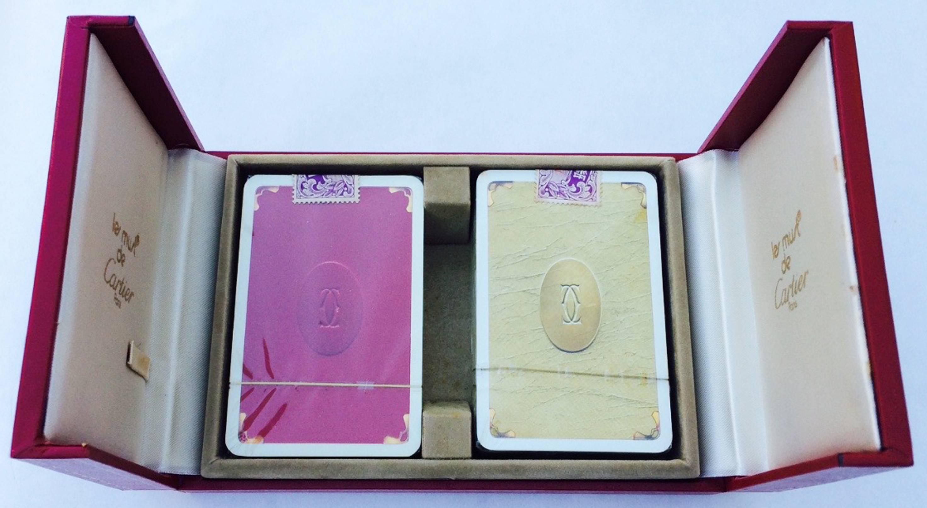 A fine Cartier double box set, playing cards. Authentic unused/unopened double deck of cards and signature box. Item pristine, previously unused.