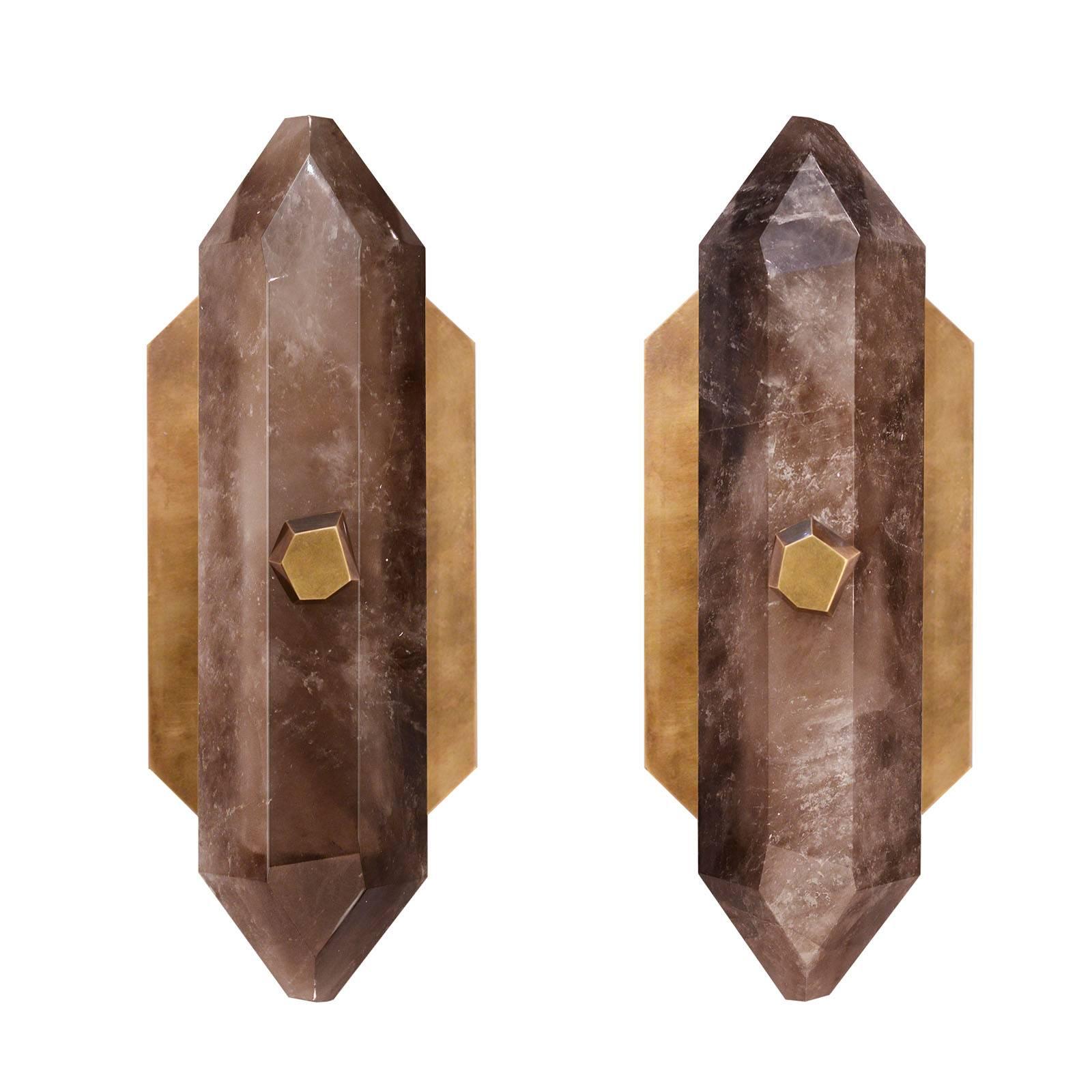 A fine carved diamond form smoky brown rock crystal quartz wall sconces with diamond form antique brass finish bolt, created by Phoenix Gallery, NYC.
Custom measurement and finish available.
Each sconces installed two sockets, and will include two