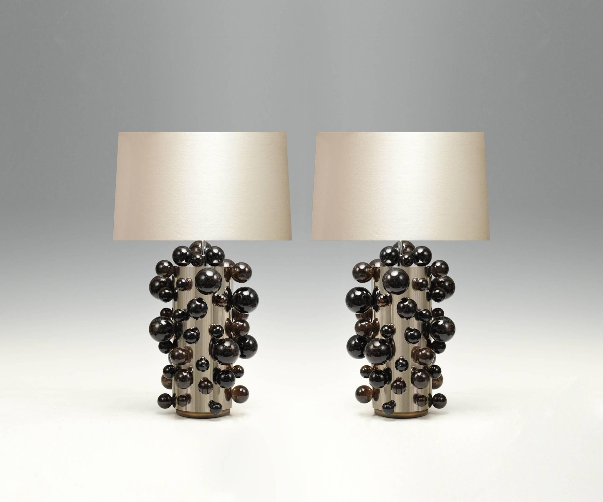 A pair of luxury dark rock crystal quartz bulb lamps with polish nickel frame. Created by Phoenix Gallery, NYC.
Lampshade not included.
 
    