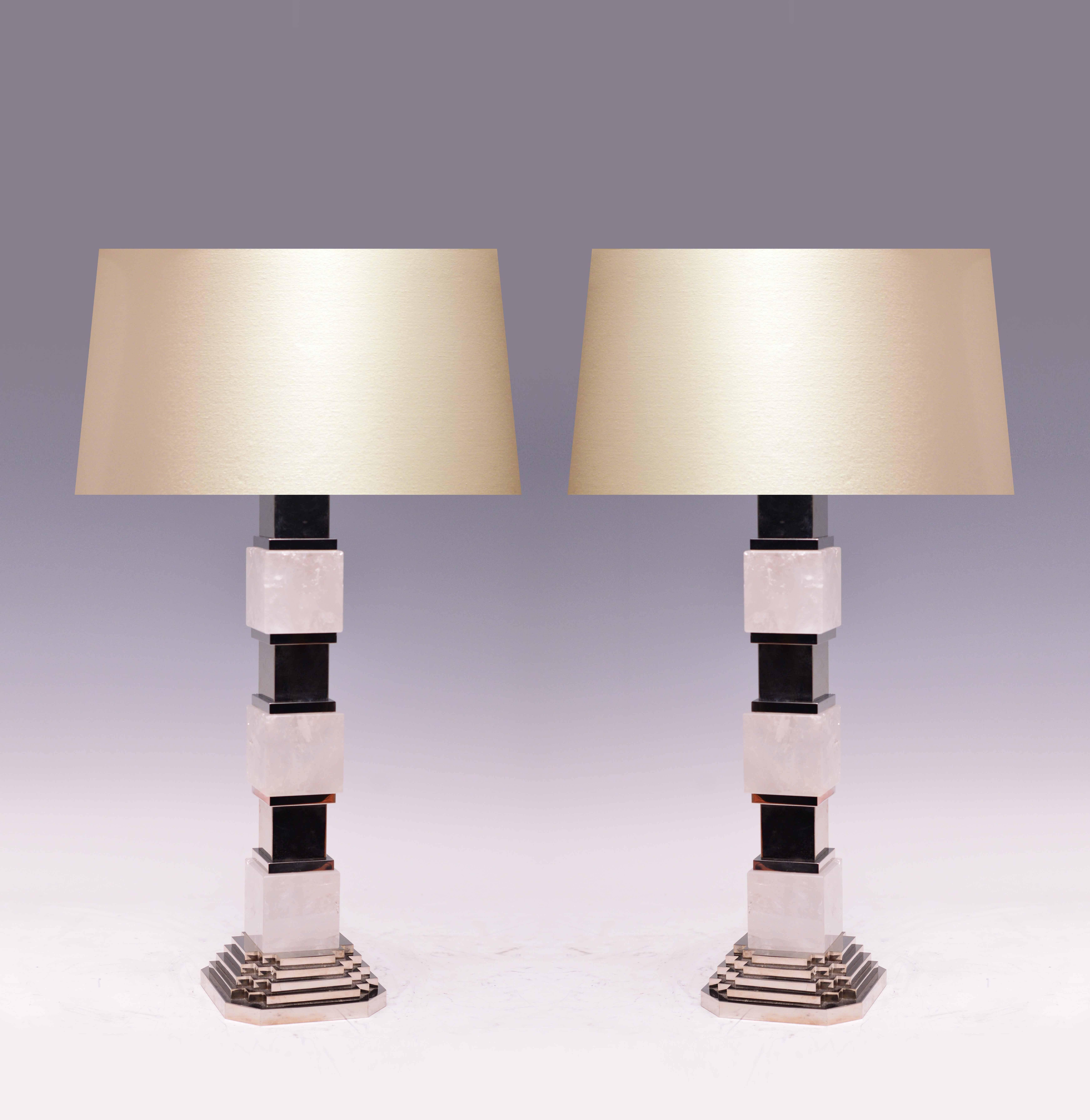 A fine carved art deco style inspired stack clear rock crystal quartz with pyramid nickel plating base and the decoration, created by Phoenix Gallery, NYC.
Available in polish brass and antique brass finished. 
To the rock crystal: