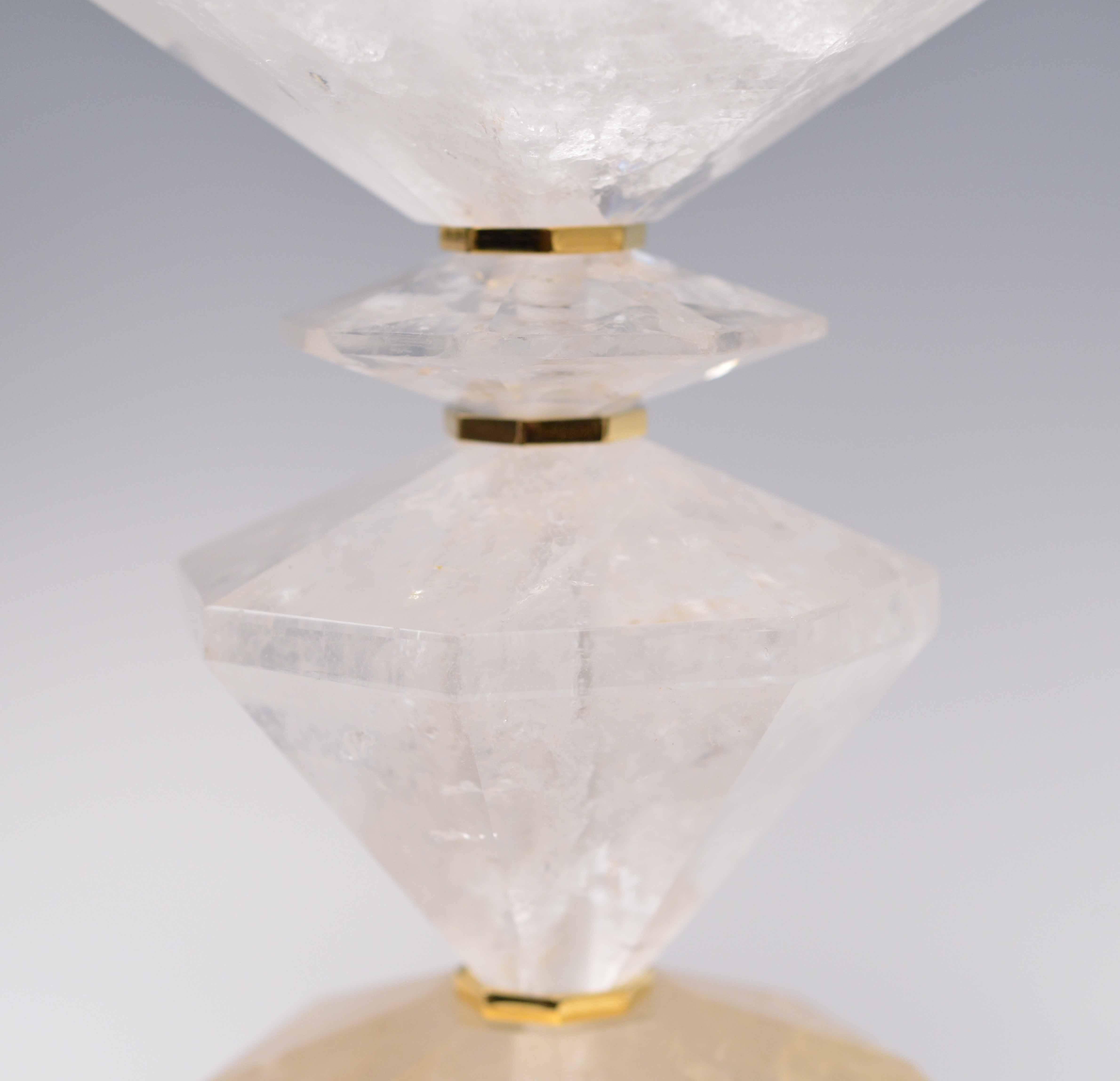A fine carved diamond form rock crystal lamp quartz lamp with polish brass insert and base, created by Phoenix Gallery, NYC.
Available in nickel plating and antique brass finished. 
To the rock crystal: 22