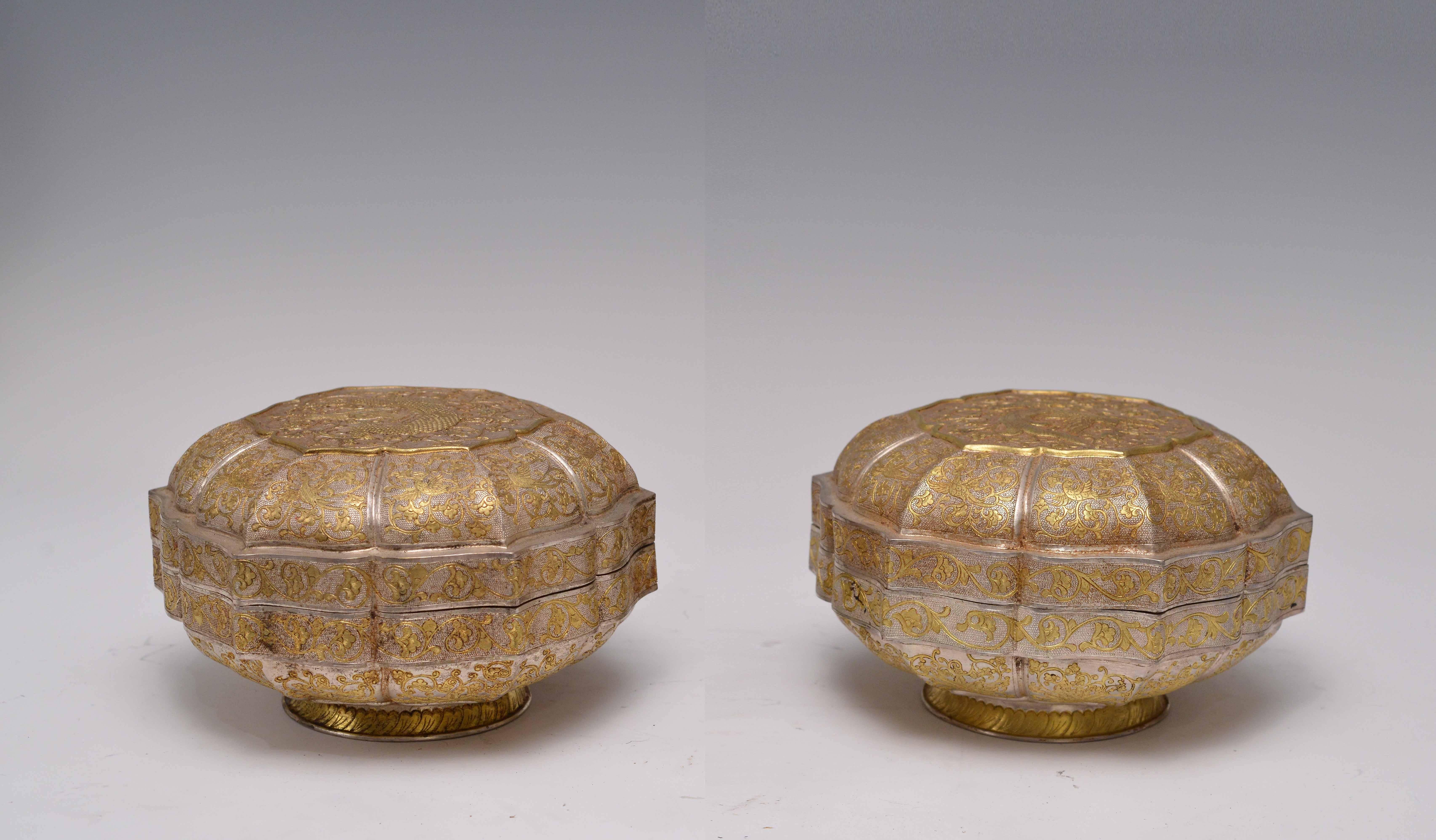 Fine repousse parcel-gilt and silvered copper boxes with dragon and phoenix decorations. From northern part of China, circa 1920.
