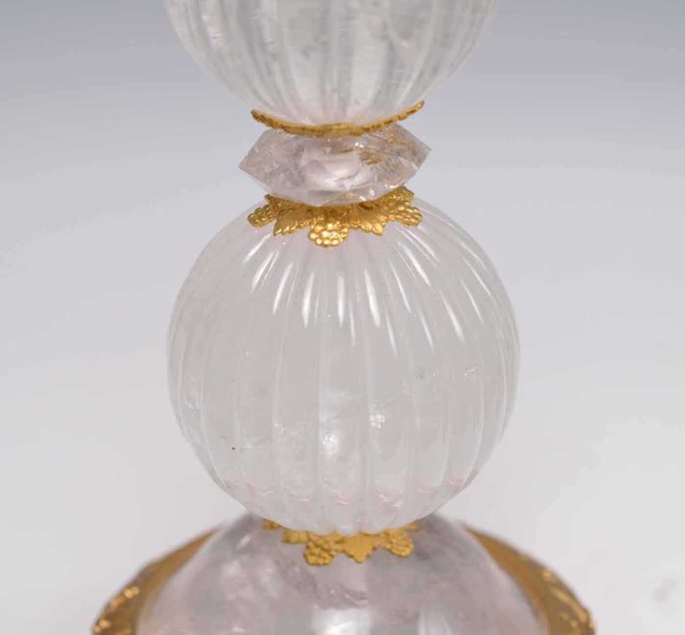 A pair of fine carved notch balls on fine cast polish brass base, created by Phoenix Gallery, NYC.
Available in nickel plating and antique brass finish. 
To the rock crystal: 17.5 in. H.
(Lampshade not included)
