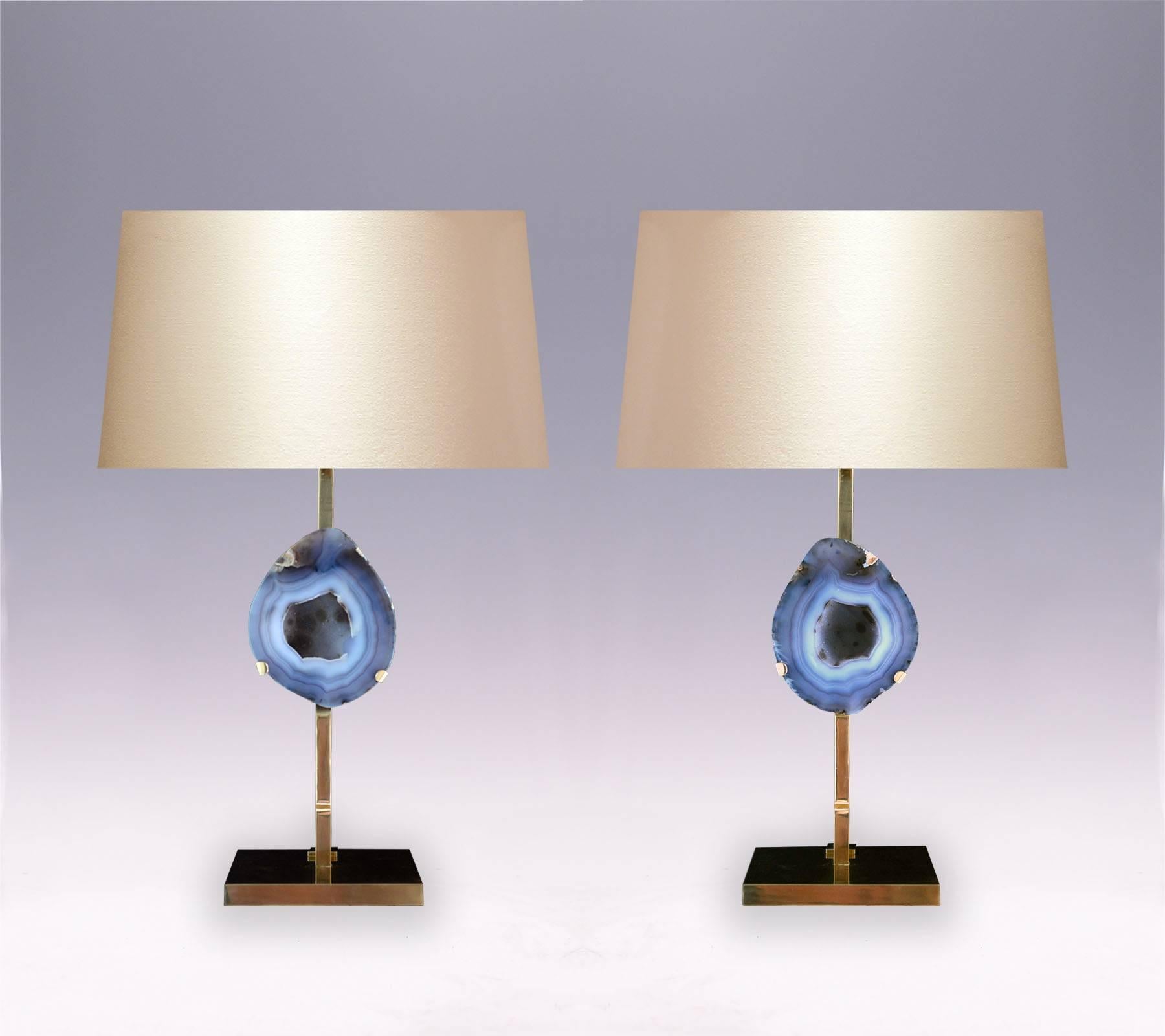 A pair of natural rare grey-blue agate lamps with polished brass mount.
(Lampshade not included)
