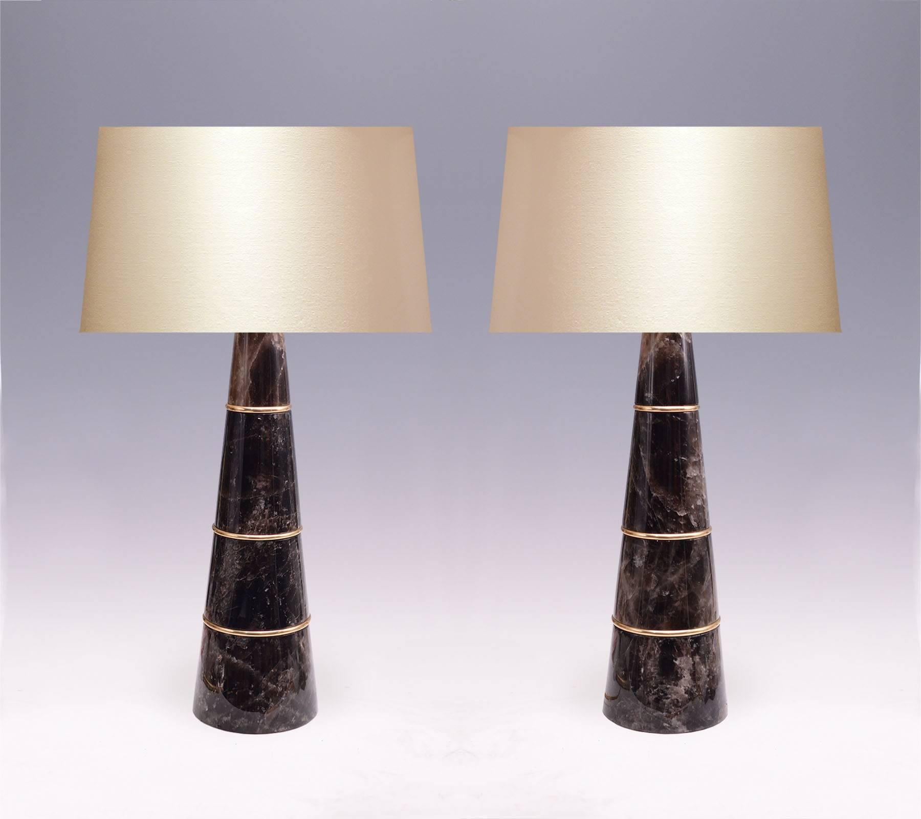 fine carved cone shape dark rock crystal quartz lamps with polished brass inserts, created by Phoenix Gallery, NYC.
To the rock crystal: 22.75