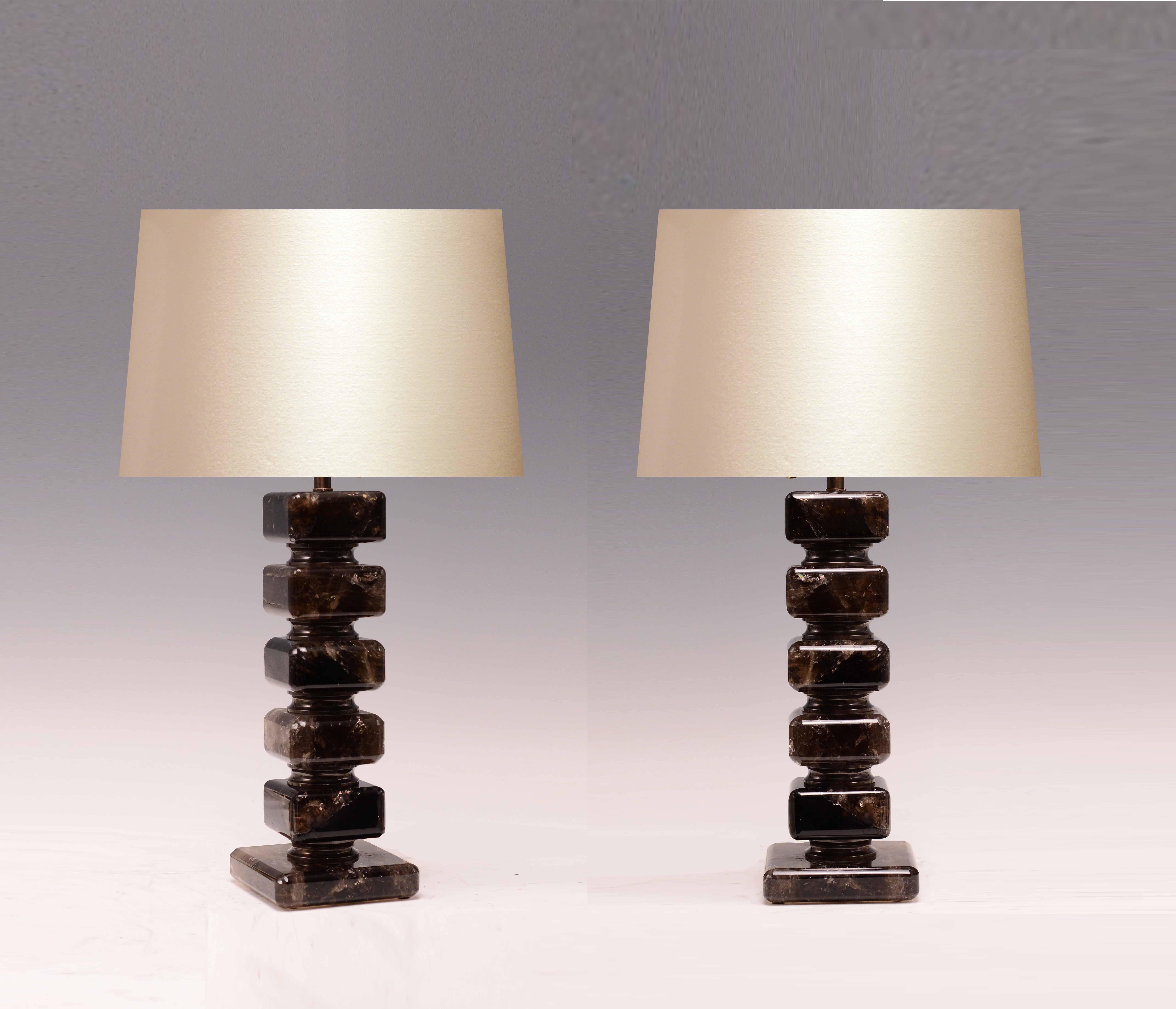 Fine carved cubic form rock crystal table lamps with antique brass insert decoration, created by Phoenix Gallery, NYC.
to the rock crystal: 14 in / H
Total height with shade: 27 in / H
(We don't supply lampshade).
