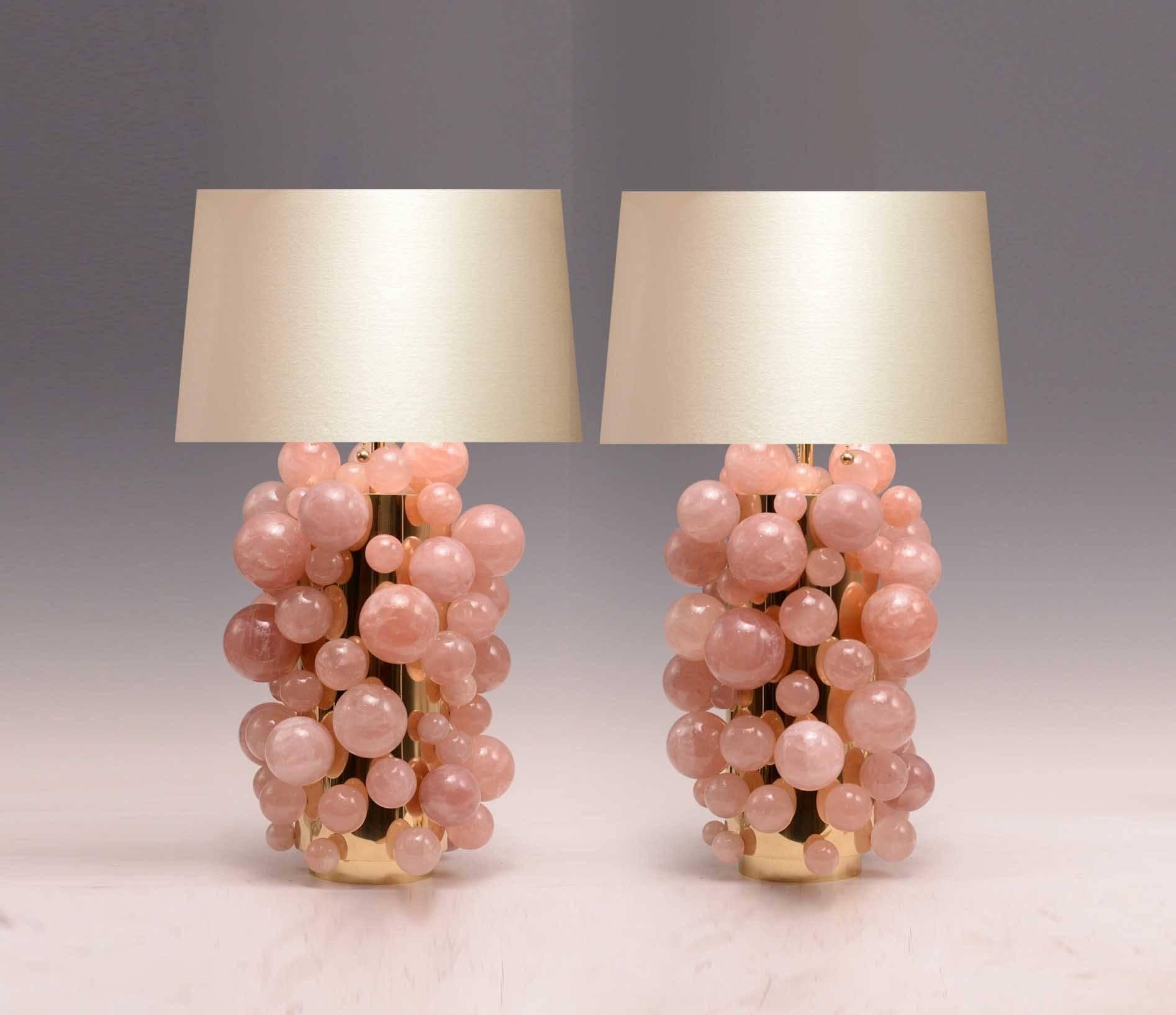 Pair of pink rock crystal bubble lamps with polish brass finish, created by Phoenix Gallery, NYC.
To the rock crystal part: 17 in/H
overall height: 30 in/H
lampshade is not included.