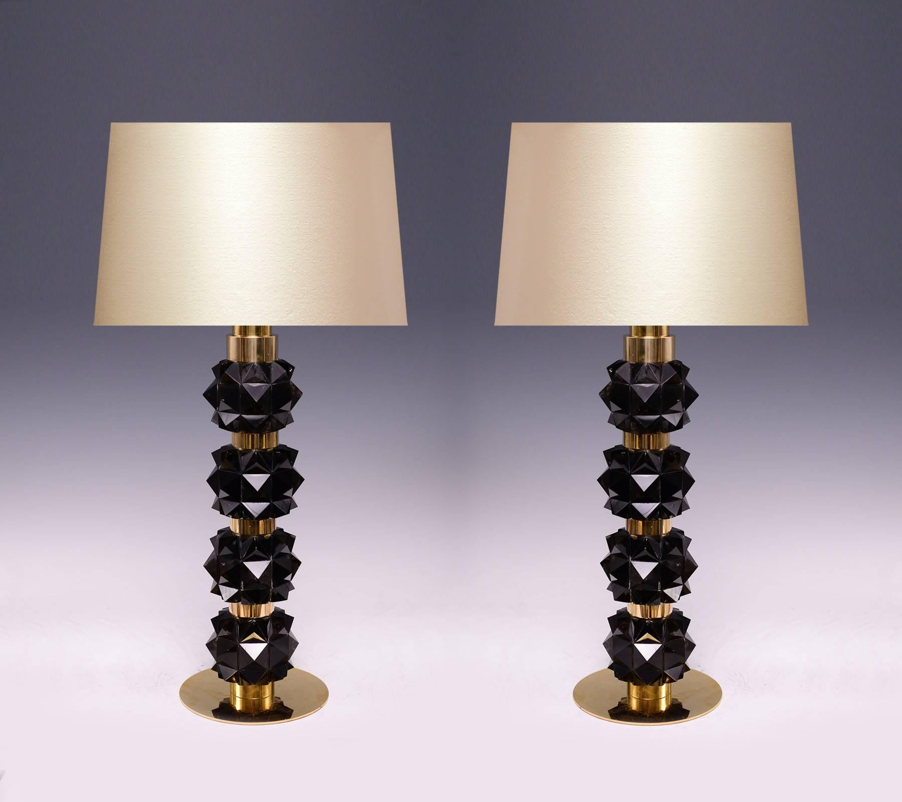 A pair of fine rock candy dark rock crystal quartz lamps with polished brass decorations, created by Phoenix gallery.
Lampshade not included.
