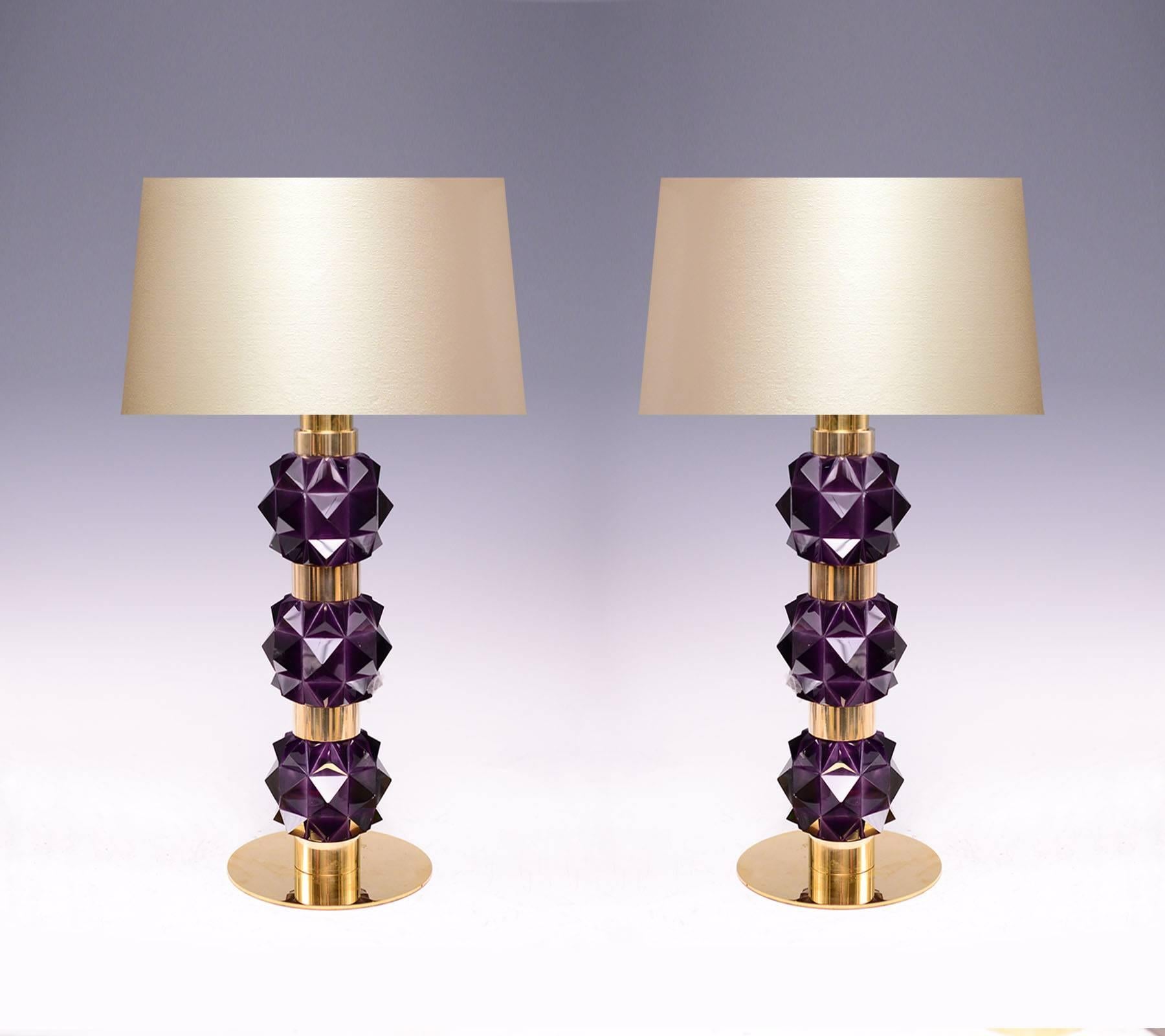 A pair of fine carved rock candy form amethyst rock crystal quartz lamps with polished brass decorations, created by Phoenix gallery.
Lampshade not included.
