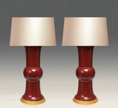 A Pair Of Oxblood Porcelain Lamps