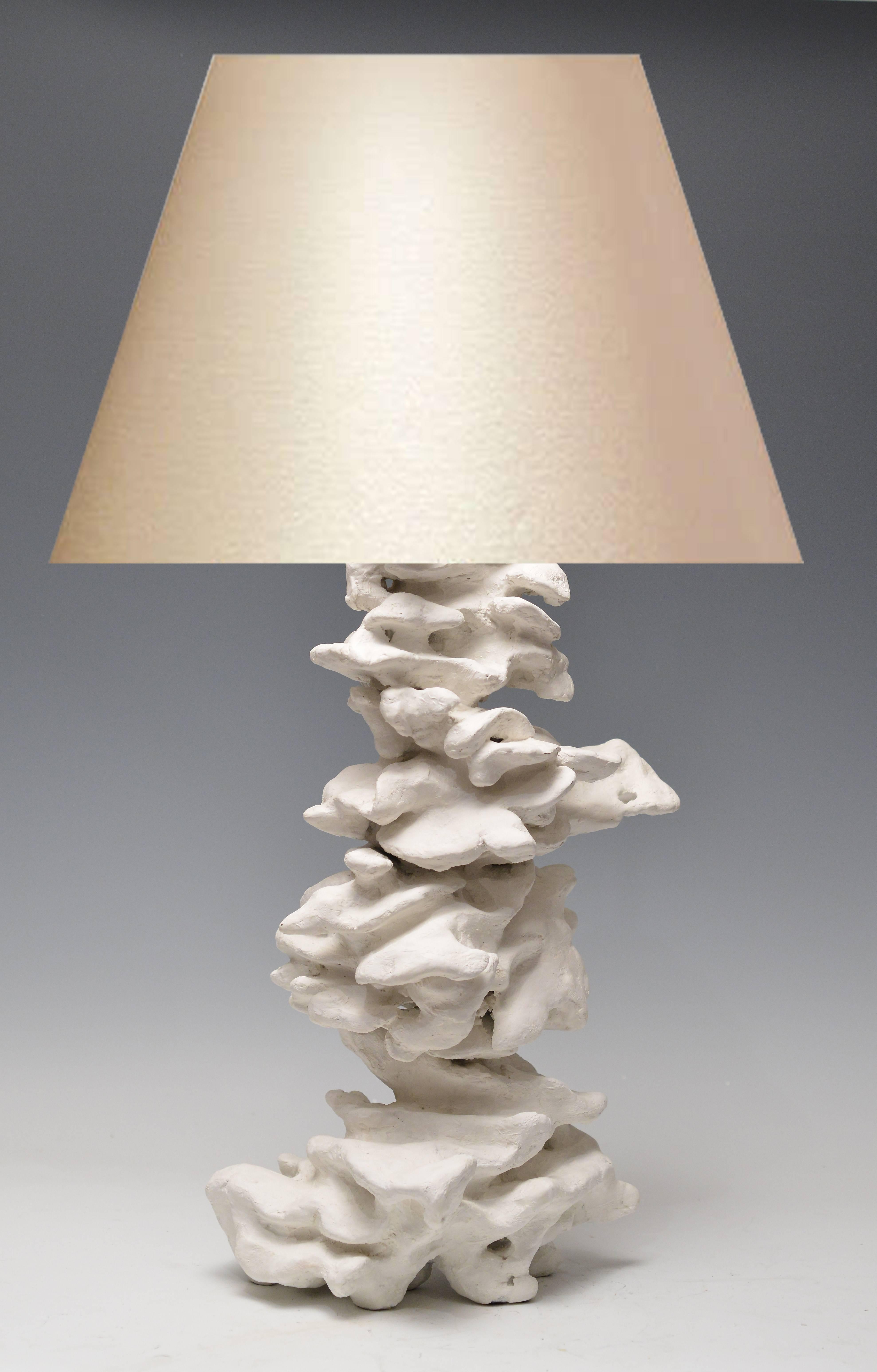 Handmade vertical rock with plaster surface, grottoes and overhang. Inspired from the natural rock.
(Lampshade not included).to the top of the sculpture 19.5 inch