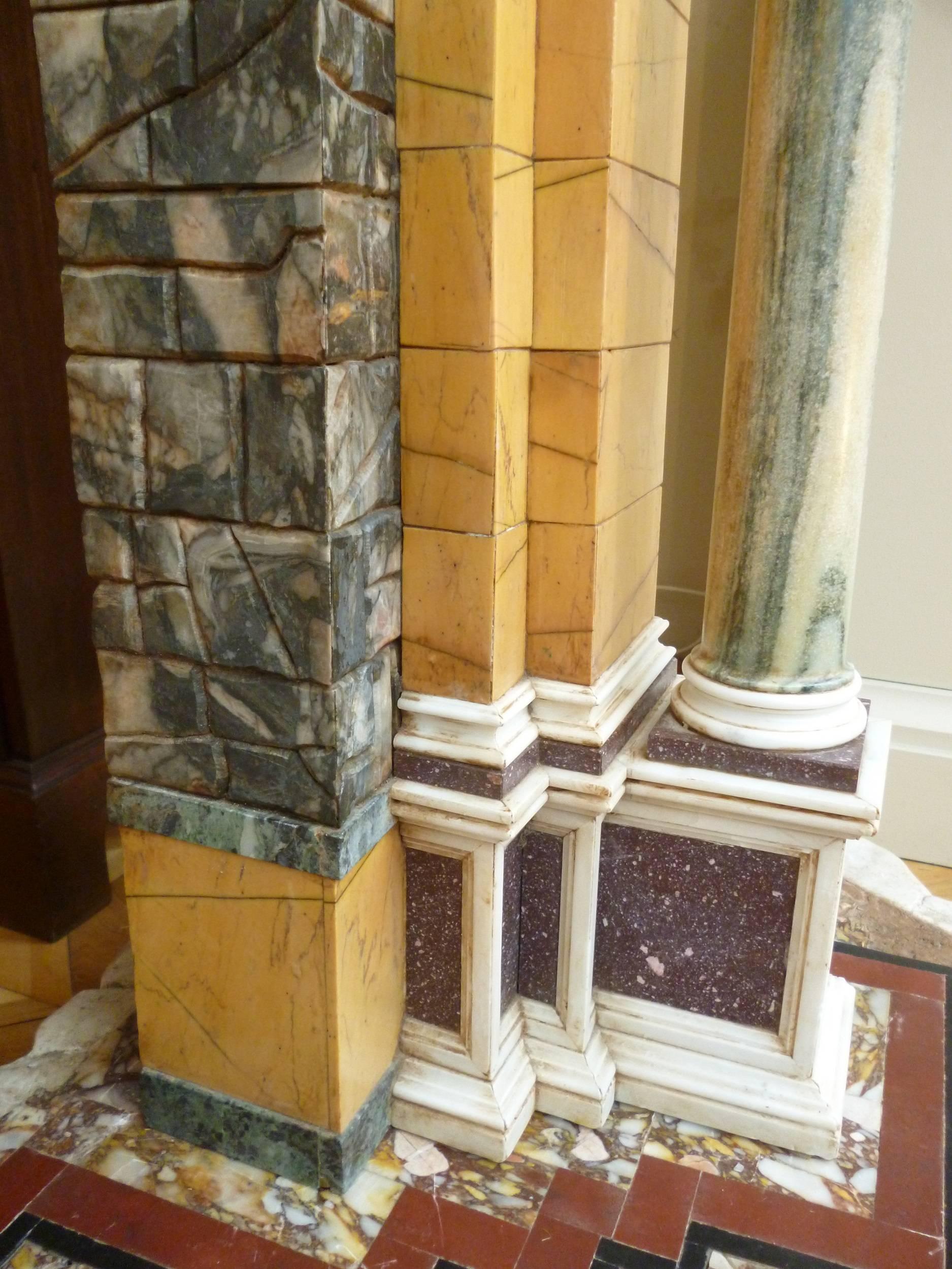 Depicting a Corinthian column flanking an archway above a paved floor in various marbles, including giallo antico, brocatello, porphyry and cipollino romano; constructed in two sections.

These models probably take inspiration from arches