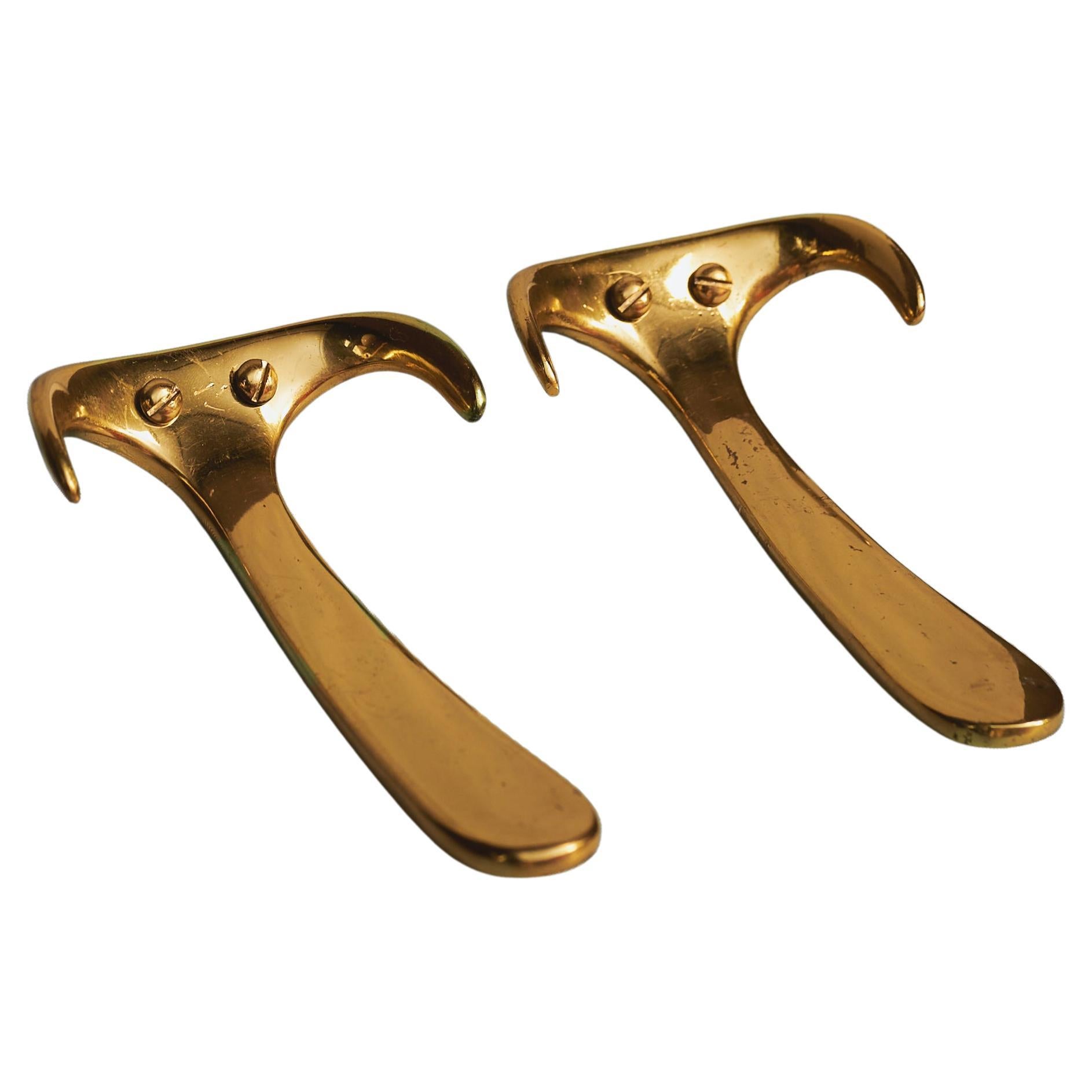 Paar Carl Auböck Model #4982 Wandhaken aus poliertem Messing, Österreich, 1950er Jahre im Angebot