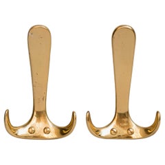 Pair of Carl Auböck Model #4982 Polished Brass Wall Hooks, Austria, 1950s