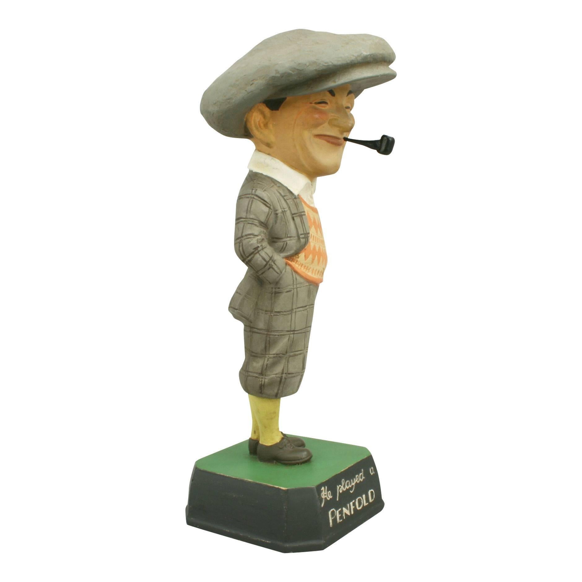 Antique advertising penfold man. Golf figure.
A colorful plaster advertising figure with an oversized cap on a base with the slogan: He played a Penfold. There are some marks to the paint work, otherwise a well restored piece. The figure would have