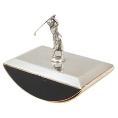 Papel secante plateado con una figura de golf