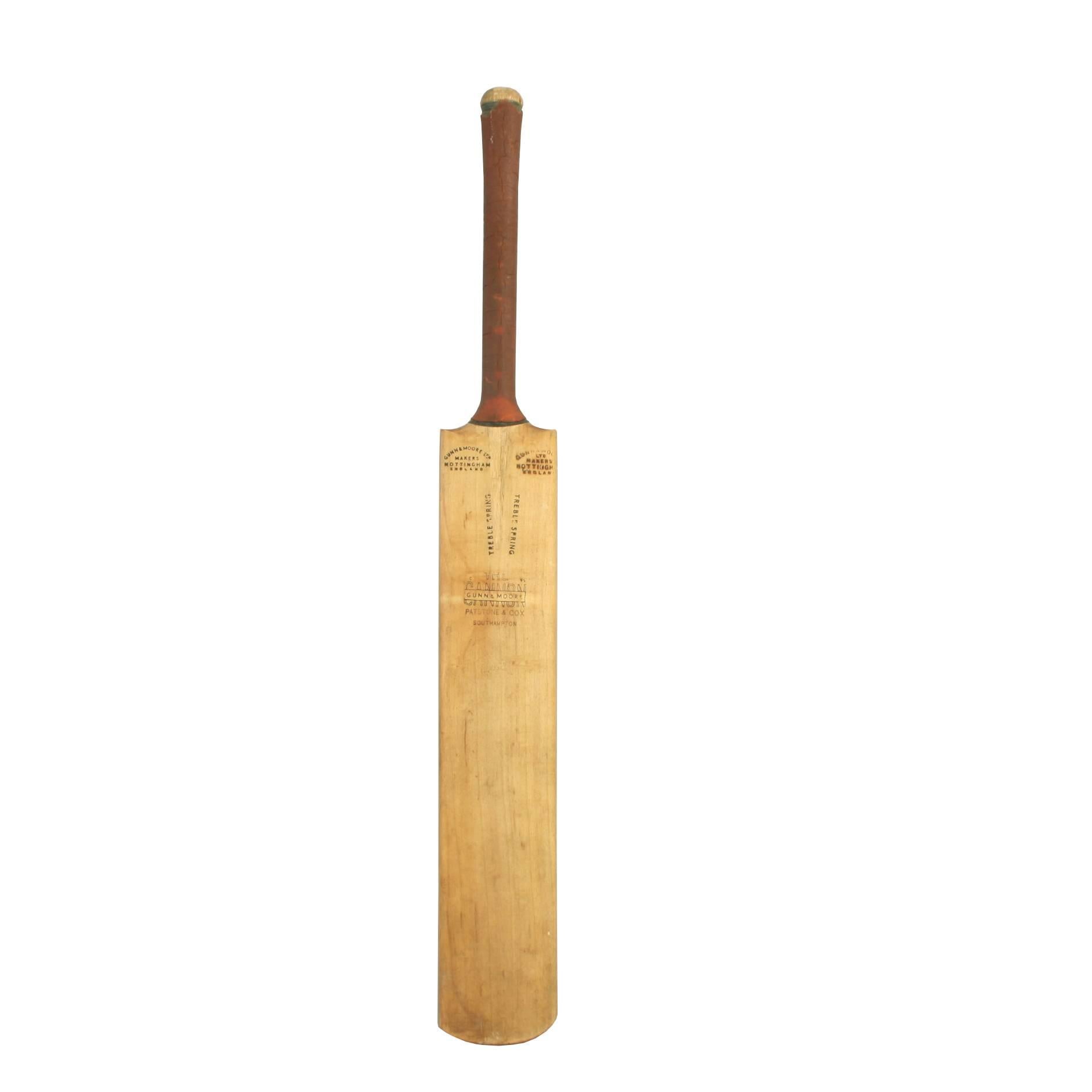 A good Gunn & Moore cricket bat 'The Cannon'. The writing on the two shoulders reads: 'Gun & Moore ltd, makers, Nottingham England', whilst on the blade treble spring, the 'Cannon', gun & Moore, 'Patstone & COX, Southampton'. A good