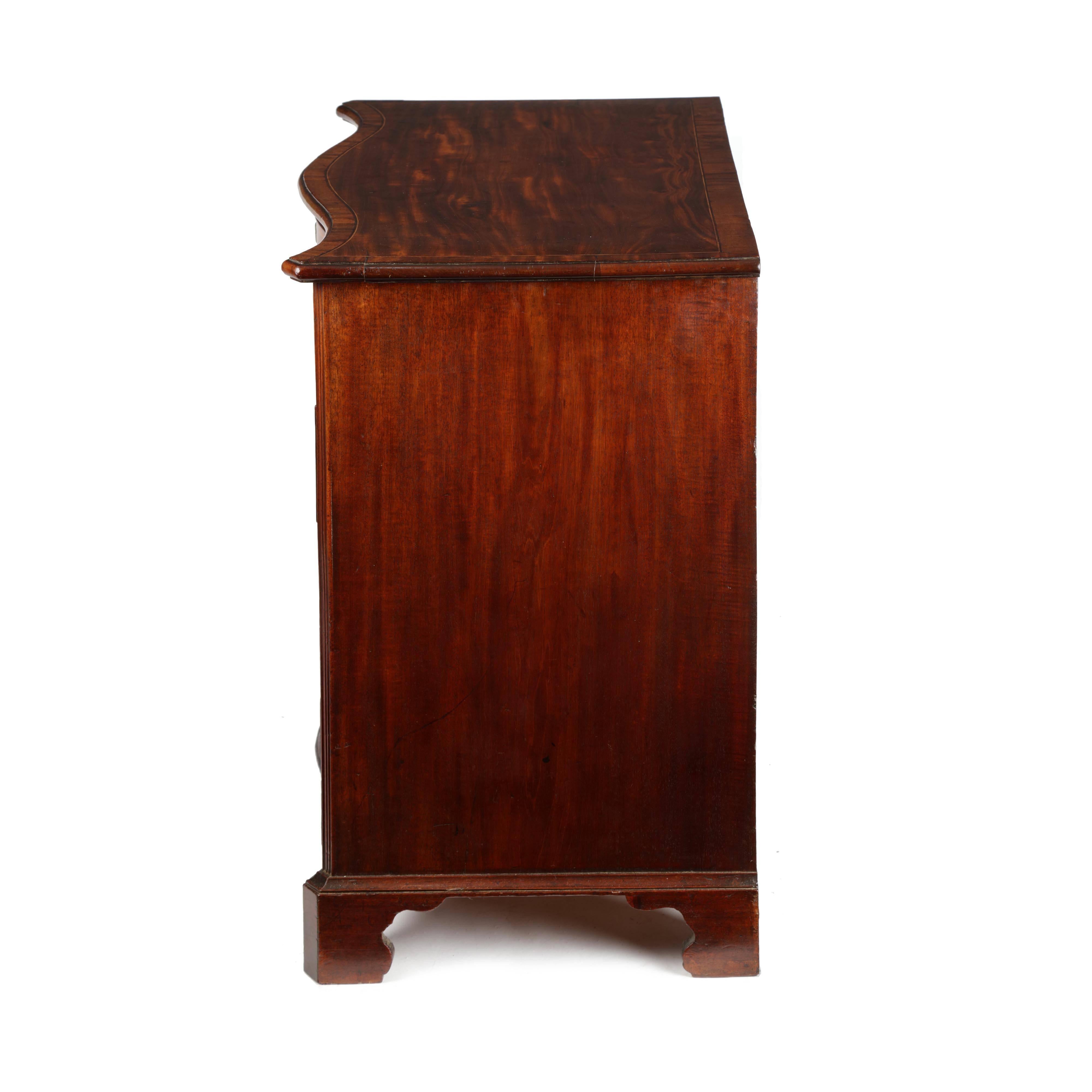 English George III Serpentine Mahogany Chest in the Manner of Henry Kettle For Sale