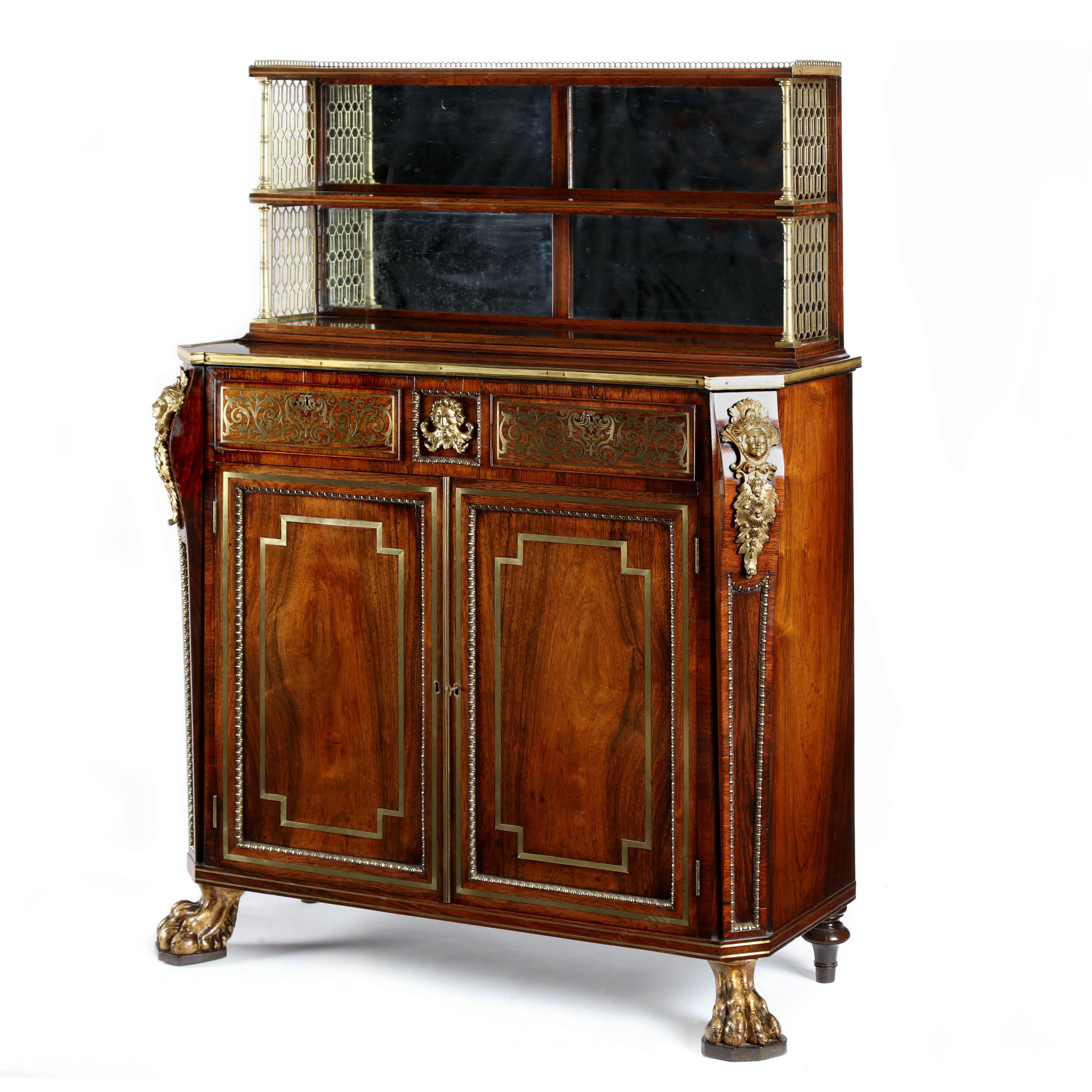 A superb pair of George III Regency period, rosewood, brass-mounted and inlaid side cabinets attributed to John Mclean. The cabinets basically of rectangular form with curved out-set front corners, with elegant brass mountings to the shoulder. The