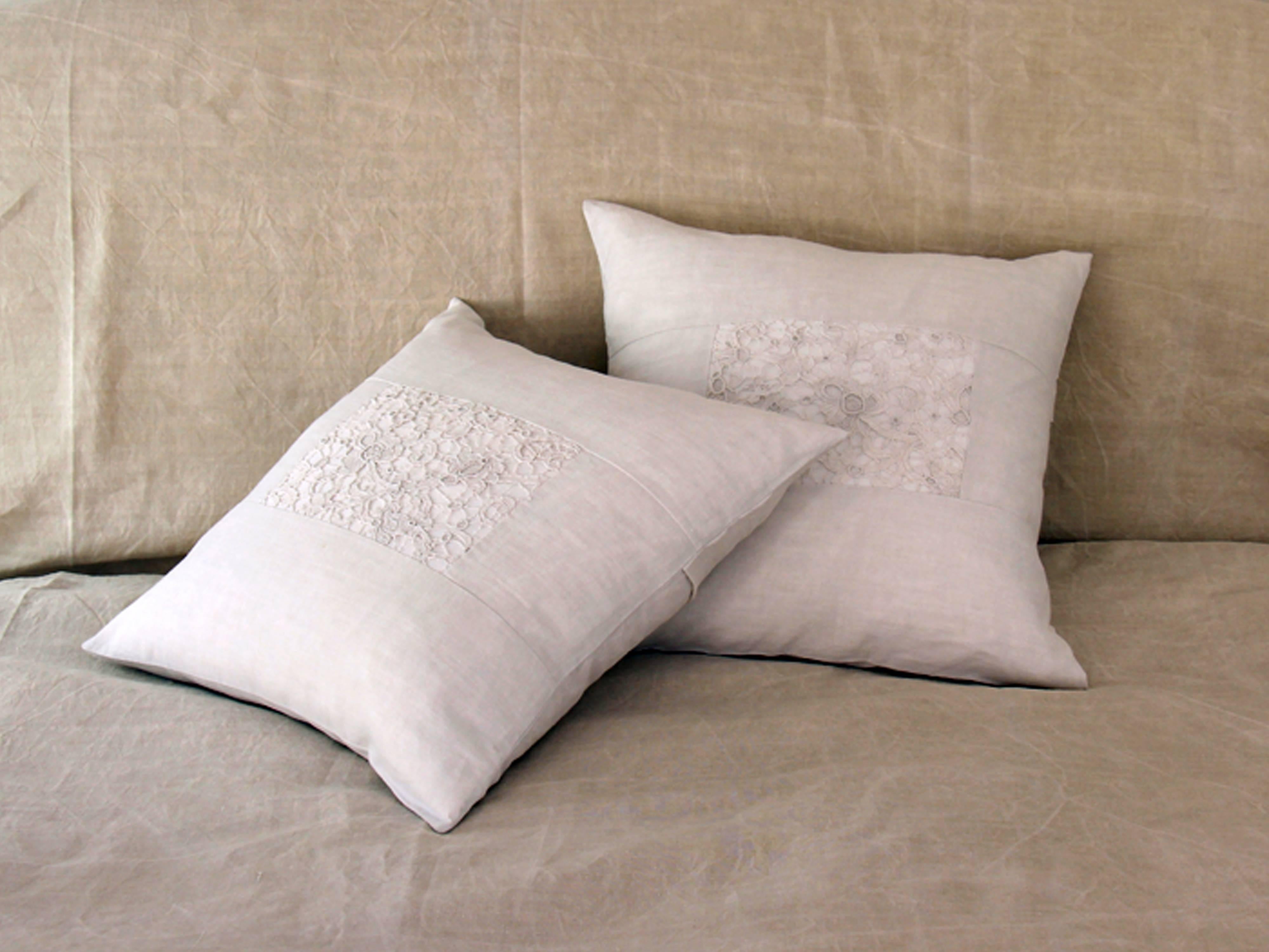 Charlotte Casadéjus collects unique and exceptional antique lace, embroidery, monograms and linens and uses them to create these wonderful pillows, cushions and bolsters.
This lovely cushion uses antique French linen as it's base with a central