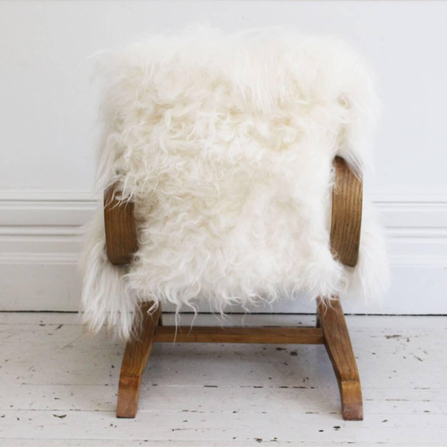 Pair of 1950s Cantilever French Armchairs Covered in Icelandic Sheepskin 1