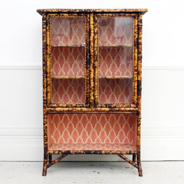 Antique Tiger Bamboo Glass Fronted Display Cabinet With Vintage Antique Tiger Bamboo Glass Fronted Display Cabinet with Vintage Wallpaper For Sale. We love all things rattan and bamboo and this is a particularly nice ... - Antique Tiger Bamboo Glass Fronted Display Cabinet With Vintage