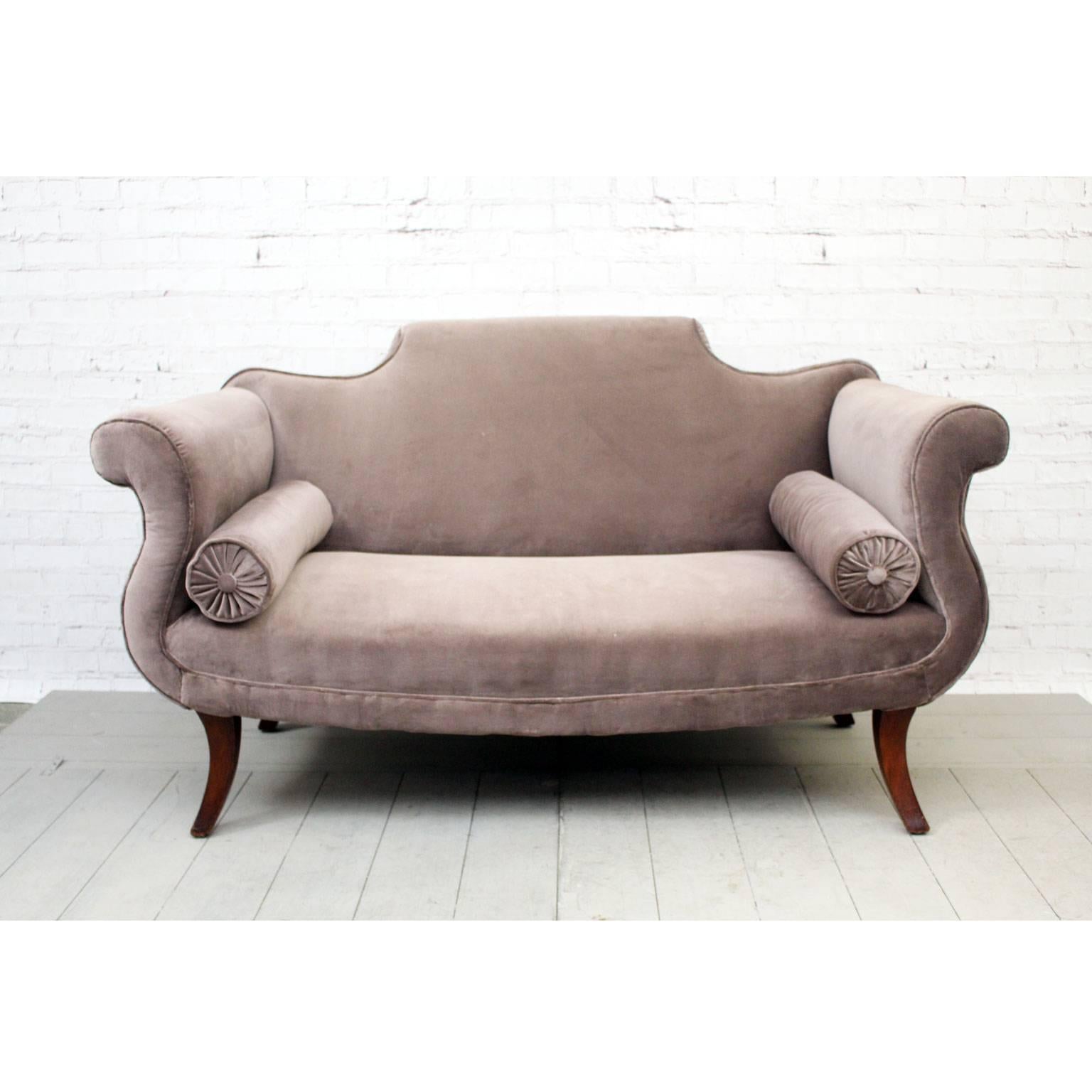 This superbly shaped Regency sofa is a thing of beauty. We love the sabre legs and curvaceous form. This is the perfect size to slot in a bedroom, a sitting room or a hallway.
Newly upholstered in mink velvet.