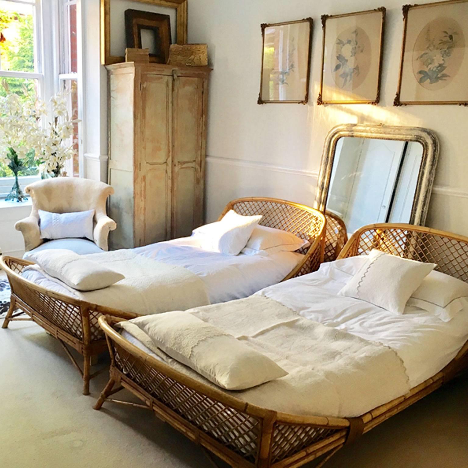 This pair of single rattan beds by Louis Sognot is superb. The clean, rounded lines, the scale and the colour all make them super stylish. In addition these beds are what we would describe as 'proper' modern size singles, so feel roomy and