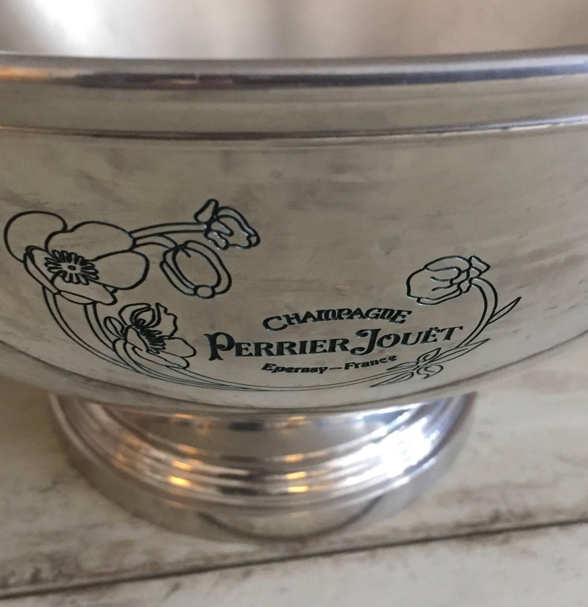 Vintage French champagne coolers from 1920-1949 in worn pewter / nickel or silver plate and feature the inscriptions along the sides 