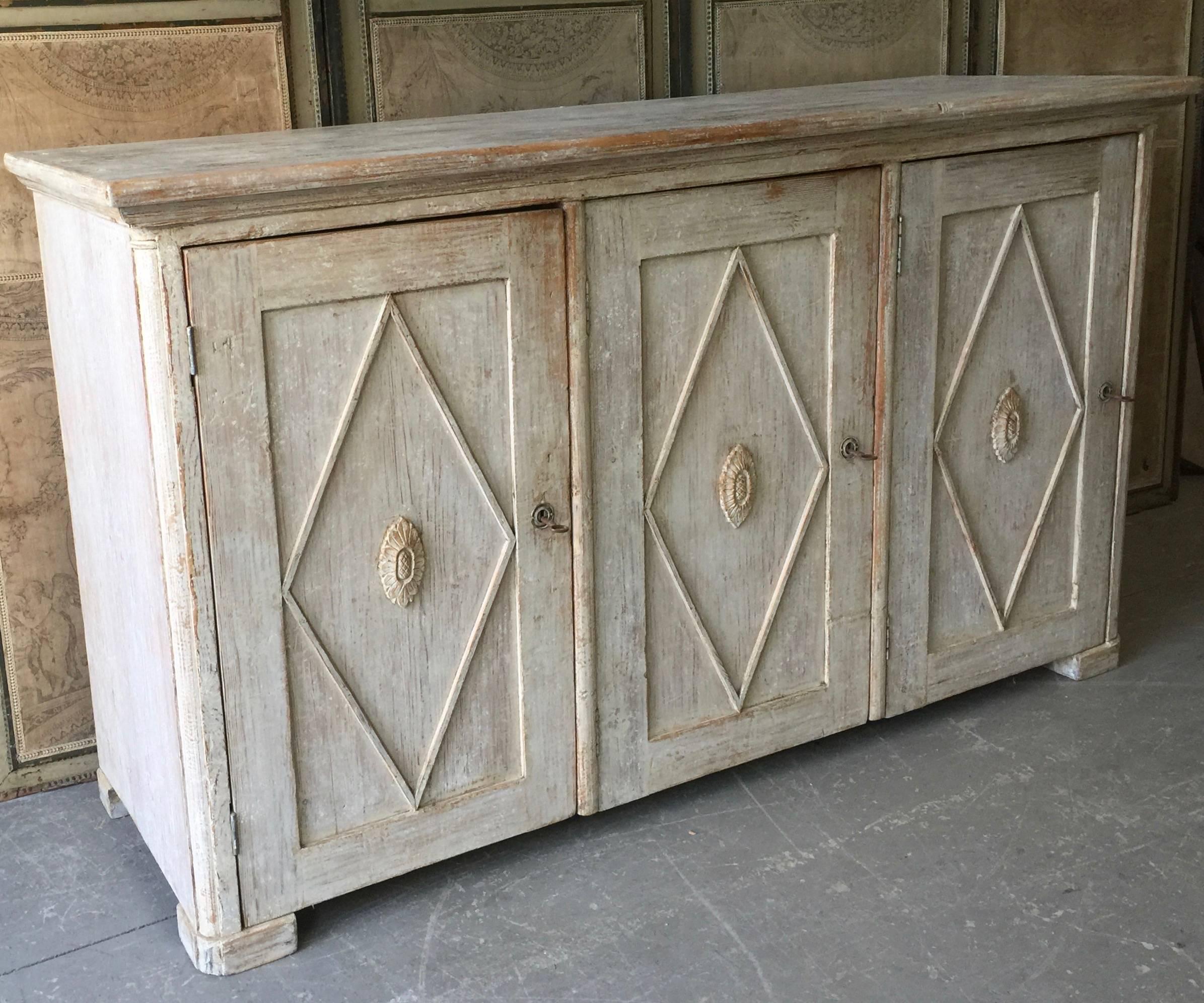 Early19th century Swedish Gustavian period sideboard in Classic Gustavian Style with beautiful diamond shaped raised panel doors.
Wonderful find! 
circa, 1800-1810 Värmland, Sweden.
Here are few examples surprising pieces and objects, authentic,