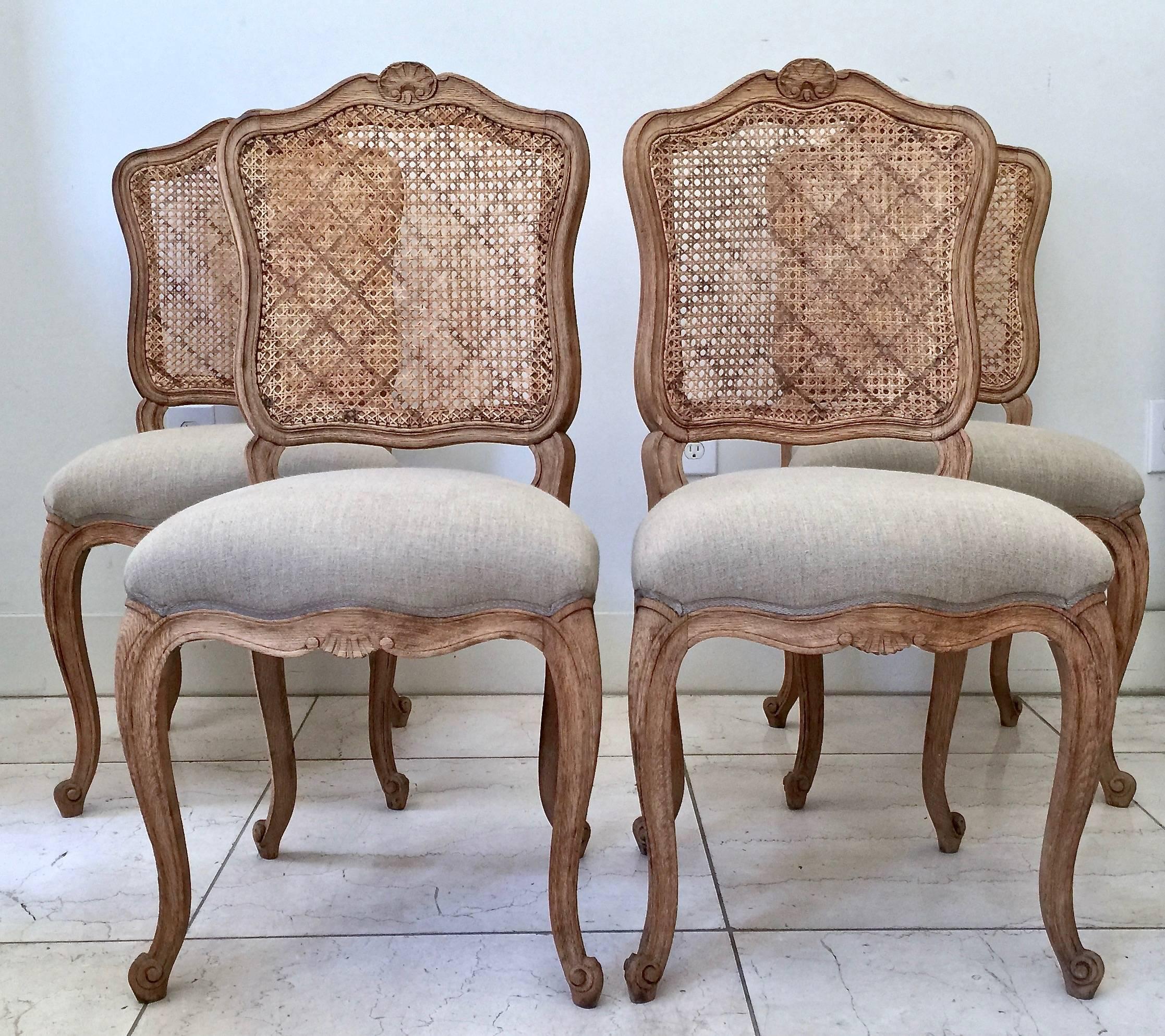 Hand-Carved Set of Four French, LXV Style Chairs with Cane Back