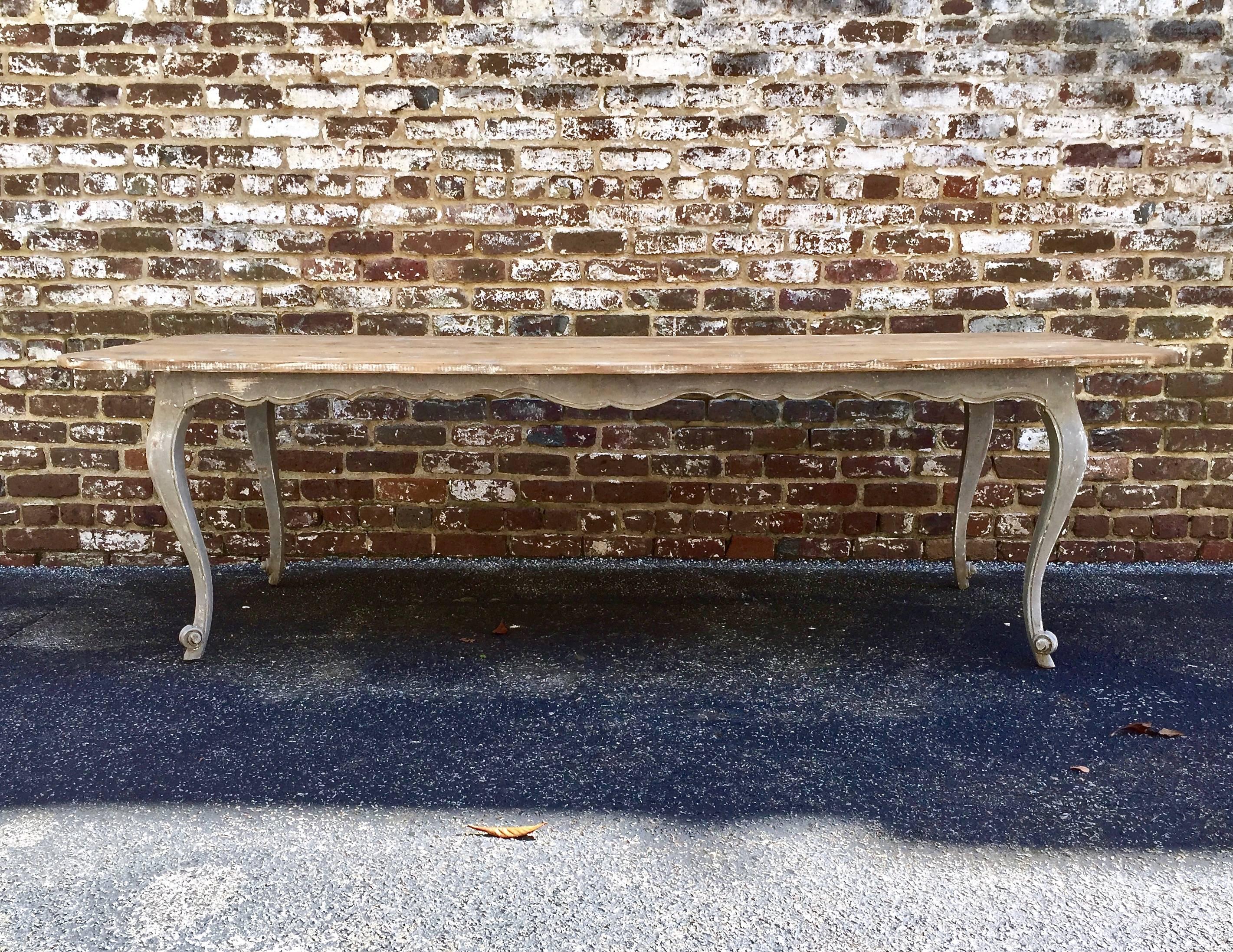 Long 19th century, French country table with wonderfully patinated top on painted base with scalloped apron and cabriole legs,
France
Here are few examples surprising pieces and objects, authentic, decorative and rare items that you will only see