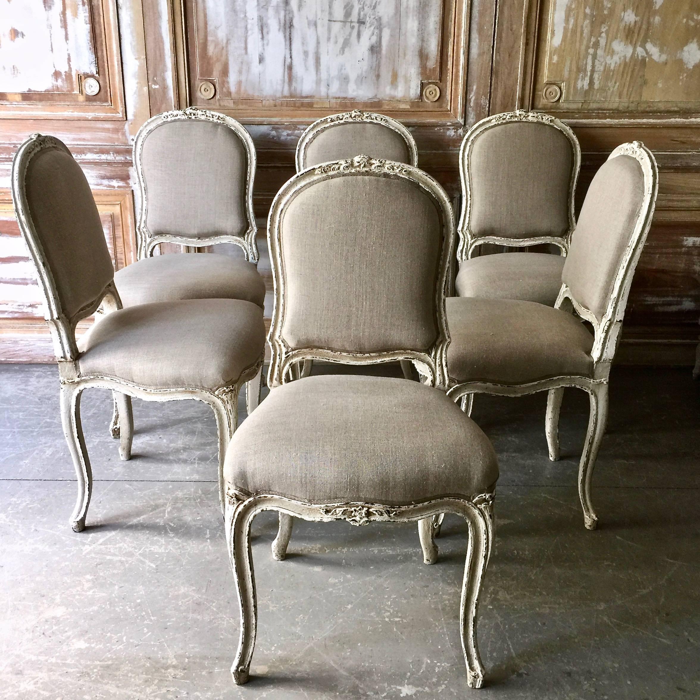 Set of six decoratively carved French Louis XV style chairs, scalloped frieze carved in floret motifs raised on cabriole legs. Upholstered in pale grey linen.
France, circa 1900.
Here are few examples surprising pieces and objects, authentic,