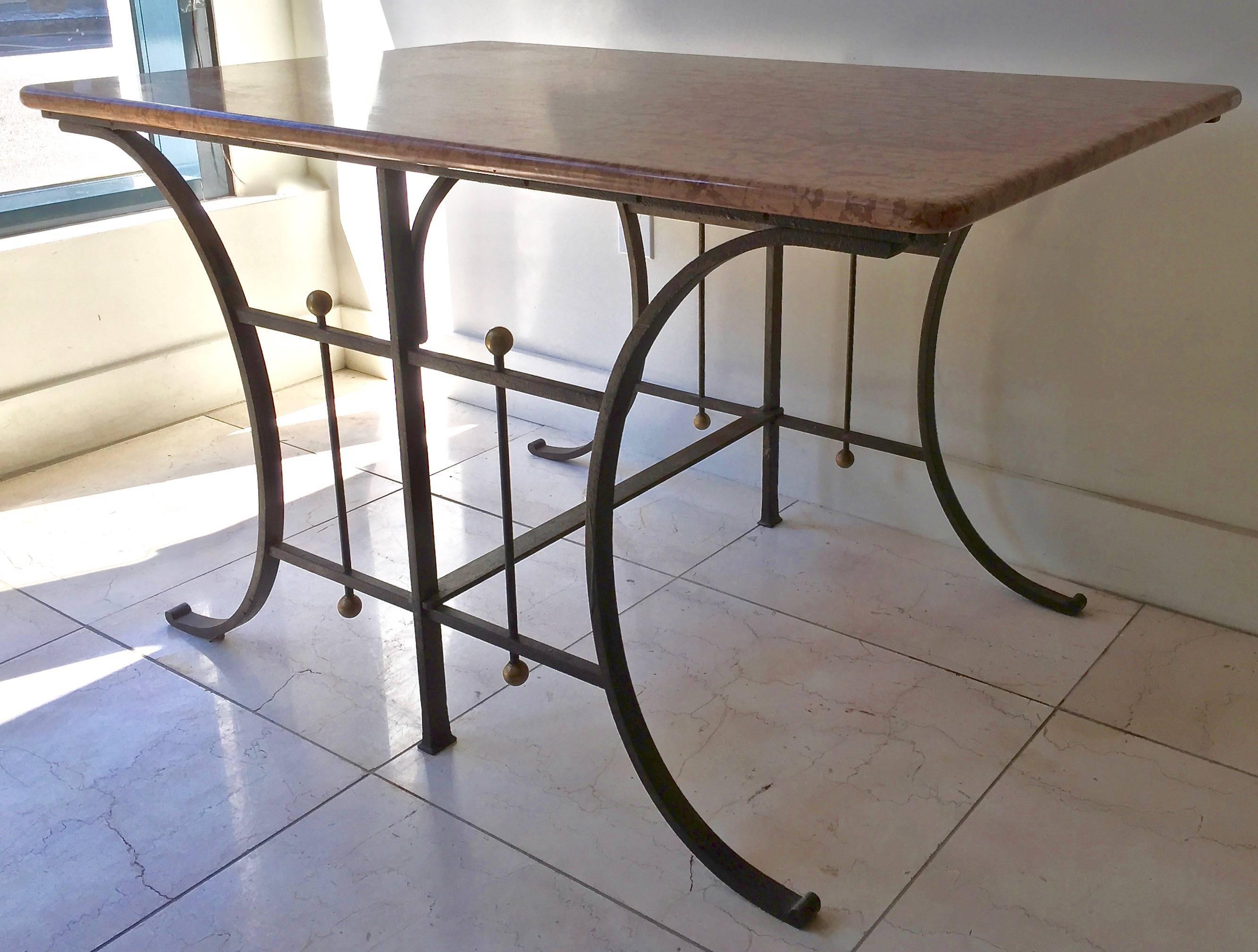 19th century French large and heavy butcher table has original rich color Italian Rosa Verona marble top and beautiful wrought iron base with brass details. The French Butcher/Pastry table were used as presentation tables in the shop's window. These