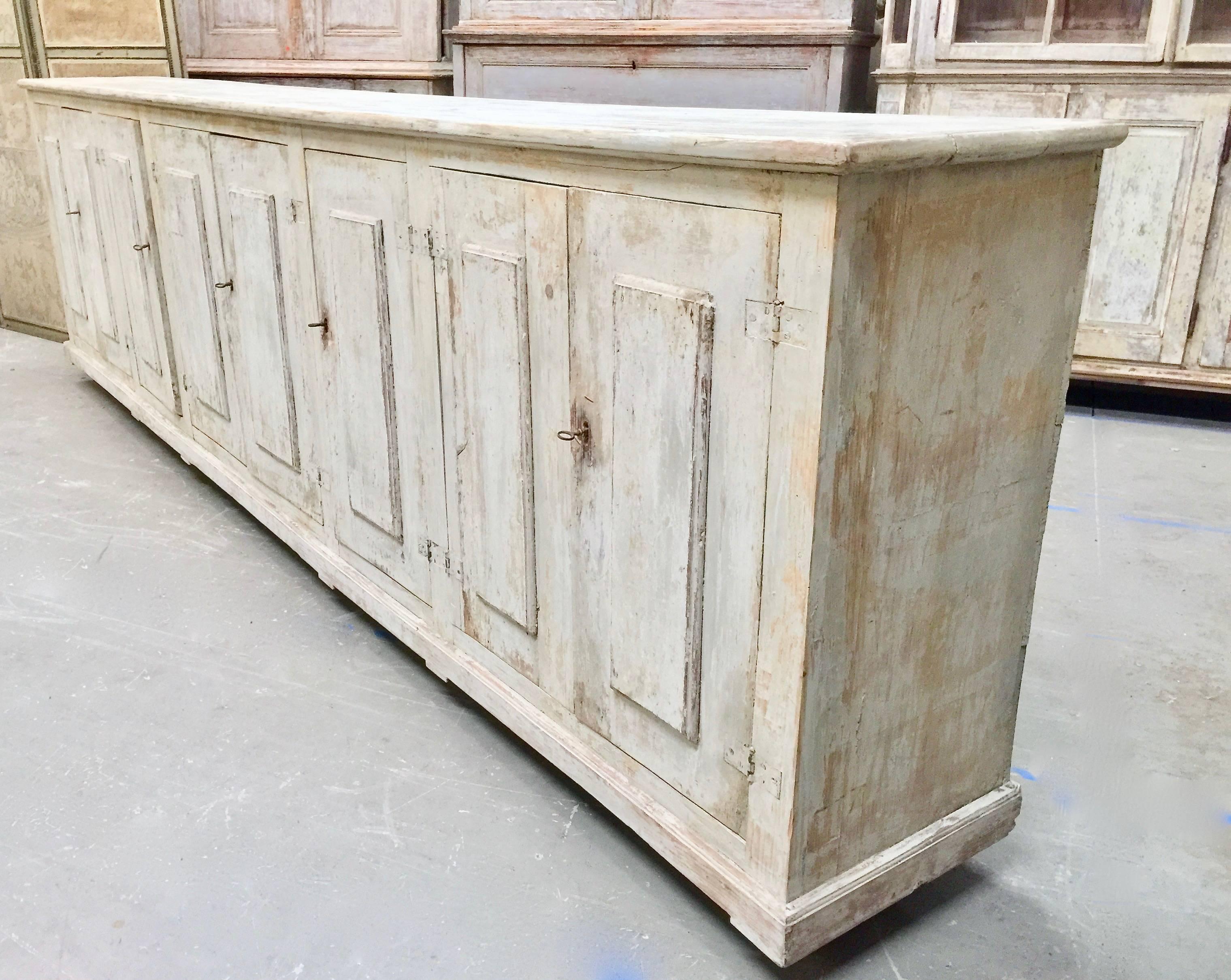 A huge, 8 door 18th century Italian painted sideboard in wonderful time worn patina and able space for storage.
Here are few examples … surprising pieces and objects, authentic, decorative and rare items that you will only see in our gallery.

