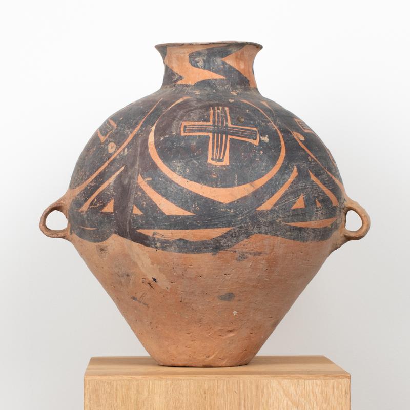 Exceptional Neolithic Chinese Painted Terracotta Storage Jar, 3rd Millennium B.C.
A rare and visually arresting terracotta storage jar from Neolithic China, dating to the 3rd millennium B.C. This large piriform vessel is richly adorned with a
