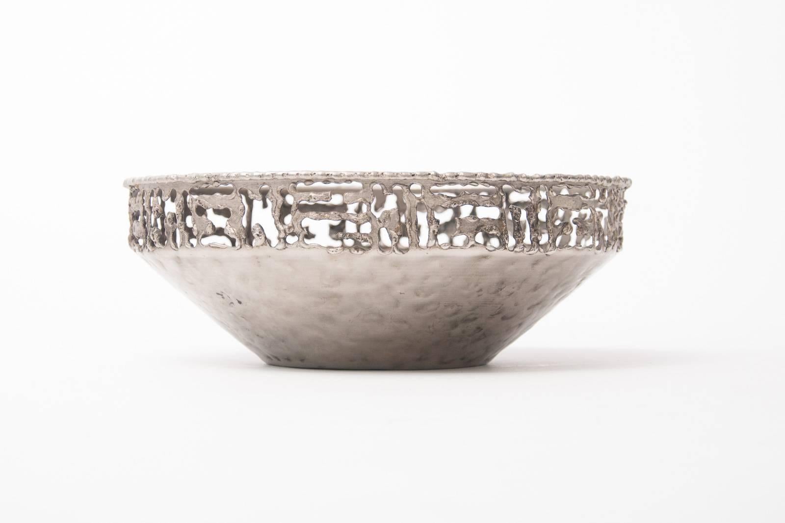 Mid-century Marcello Fantoni brutalist hammered metal torch cut bowl. Stamped twice 